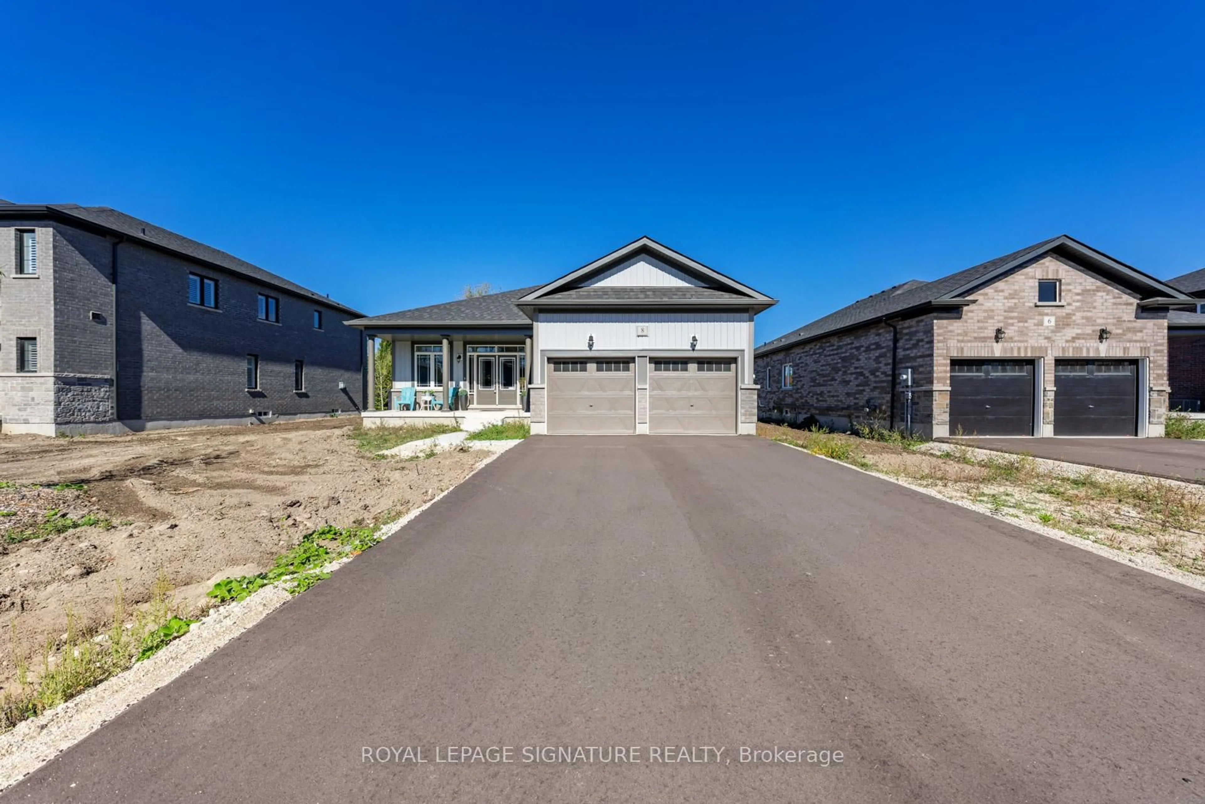 A pic from outside/outdoor area/front of a property/back of a property/a pic from drone, street for 8 Misty Ridge Rd, Wasaga Beach Ontario L9Z 0R8