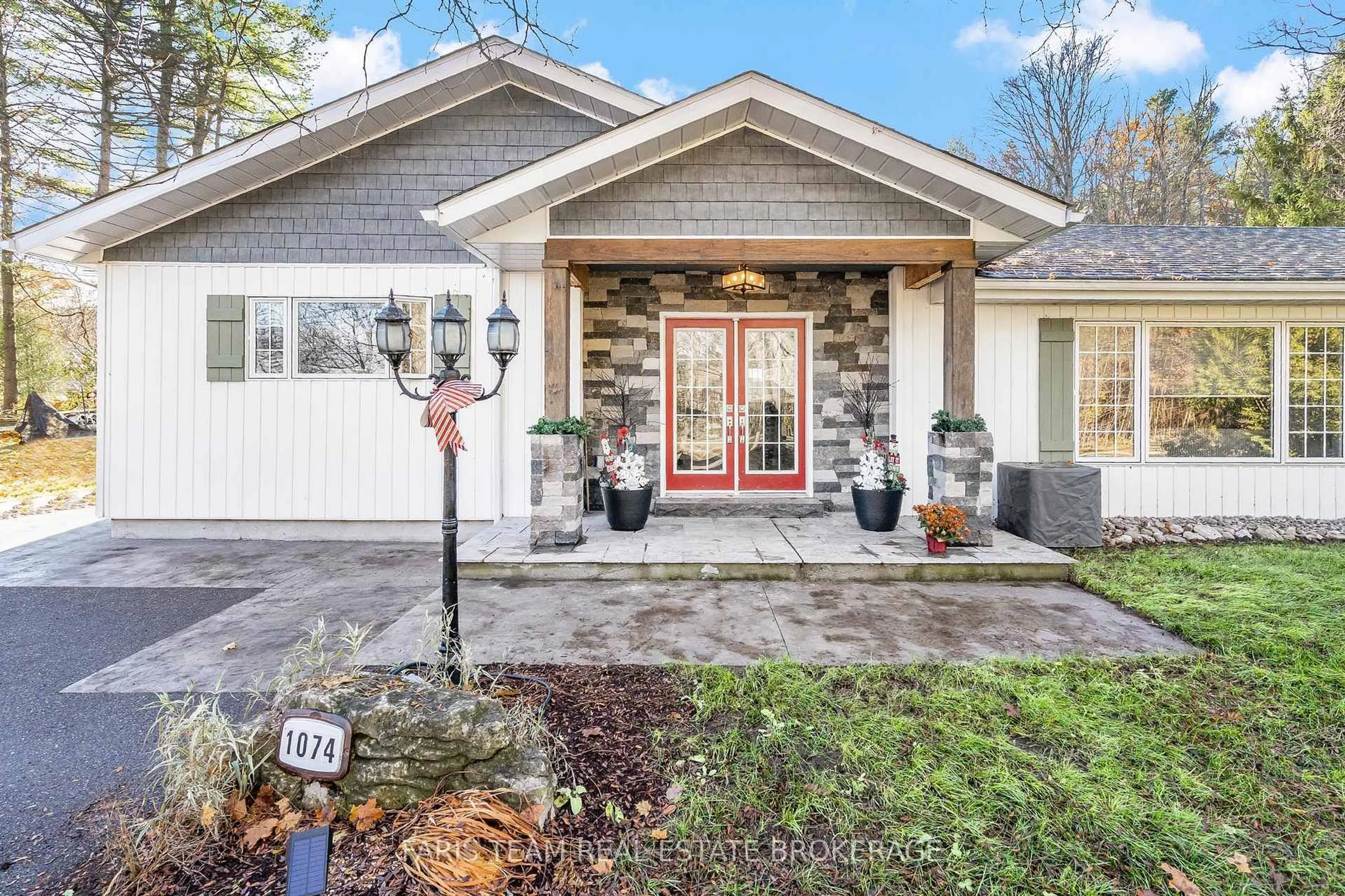 Home with brick exterior material, street for 1074 Lafontaine Rd, Penetanguishene Ontario L9M 1P9