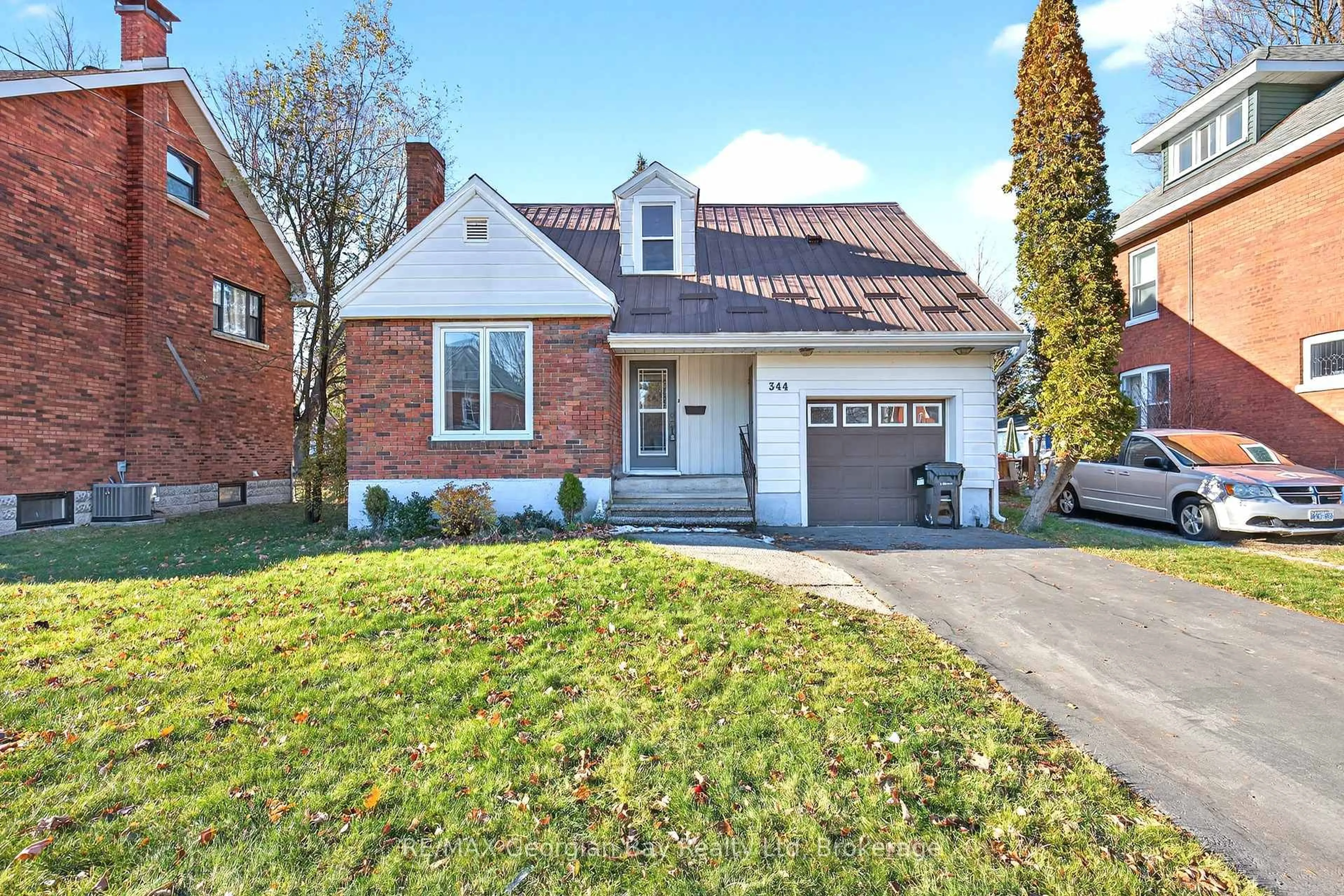 Home with brick exterior material, street for 344 MANLY St, Midland Ontario L4R 3C9