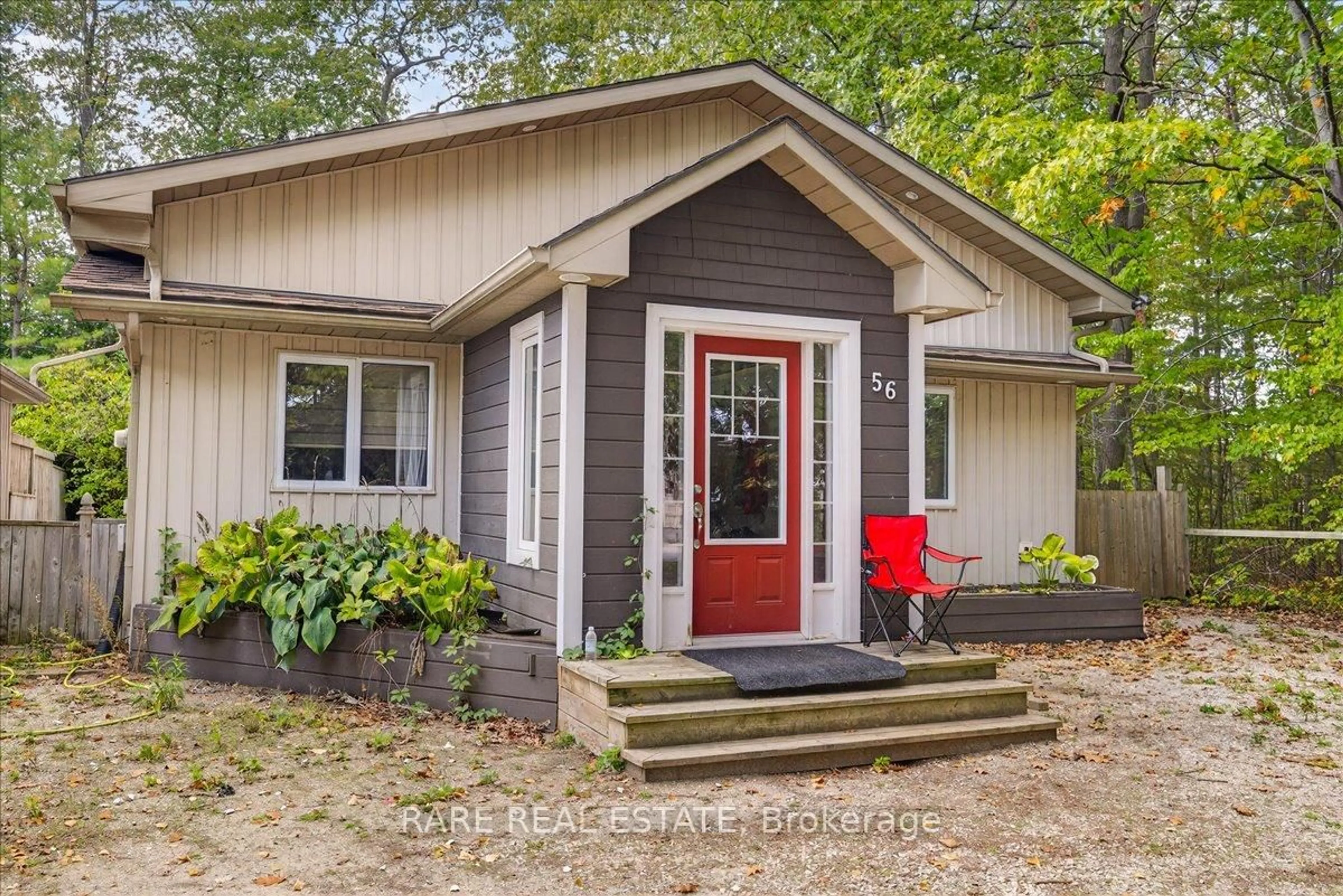 Home with vinyl exterior material, street for 56 SMALLMAN Dr, Wasaga Beach Ontario L9Z 1L1