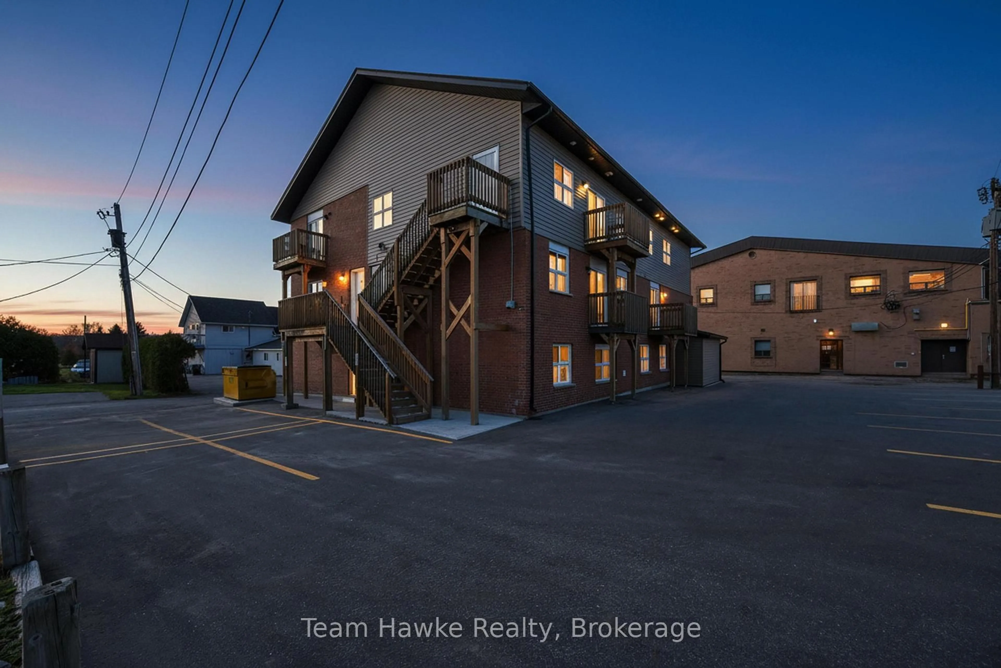 A pic from outside/outdoor area/front of a property/back of a property/a pic from drone, street for 2 Tessier Dr, Penetanguishene Ontario L9M 1V4