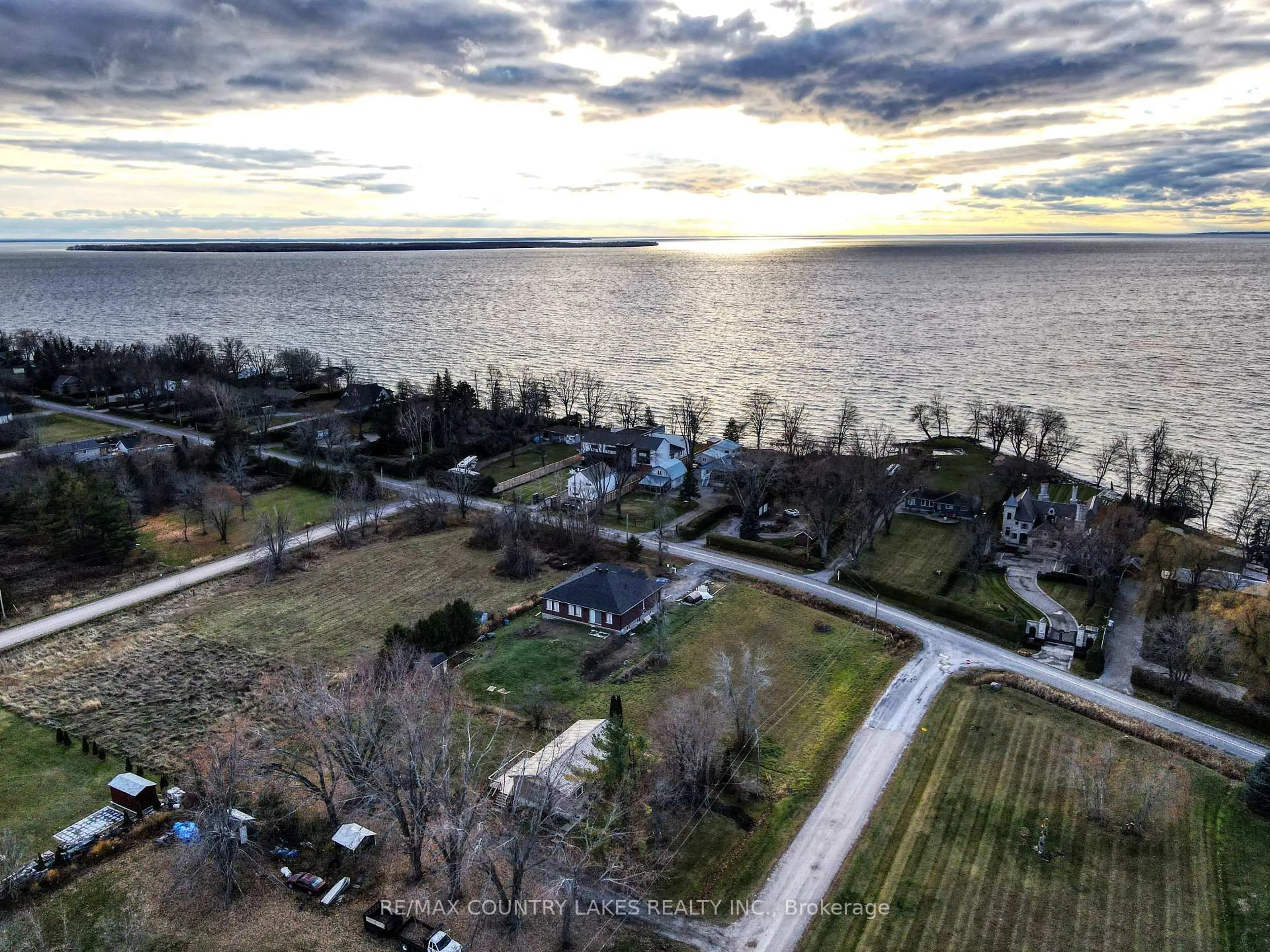 A pic from outside/outdoor area/front of a property/back of a property/a pic from drone, water/lake/river/ocean view for 2899 Georgina Dr, Ramara Ontario L0K 1B0