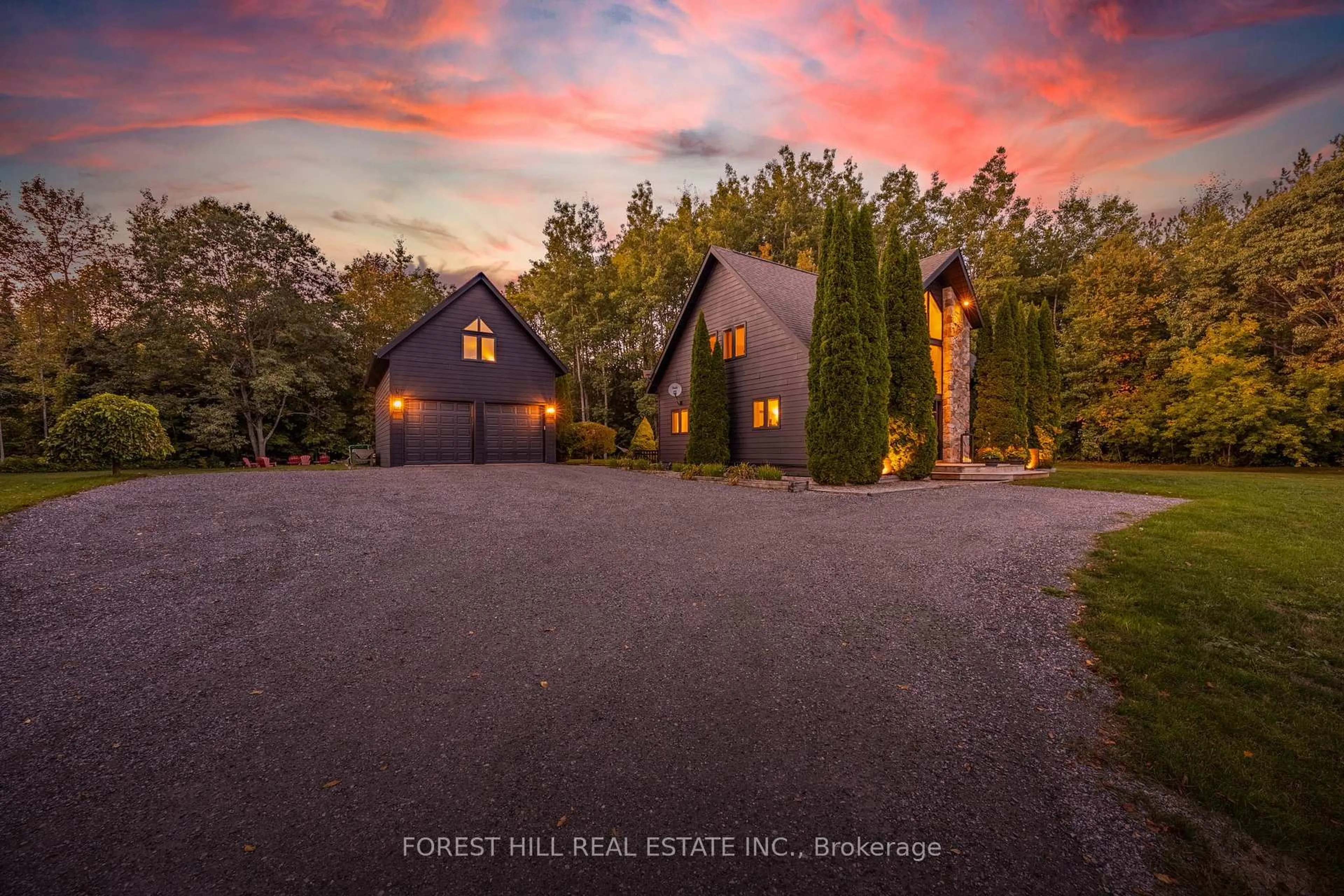 A pic from outside/outdoor area/front of a property/back of a property/a pic from drone, forest/trees view for 3328 Flos Road 6 Rd, Springwater Ontario L0L 2K0