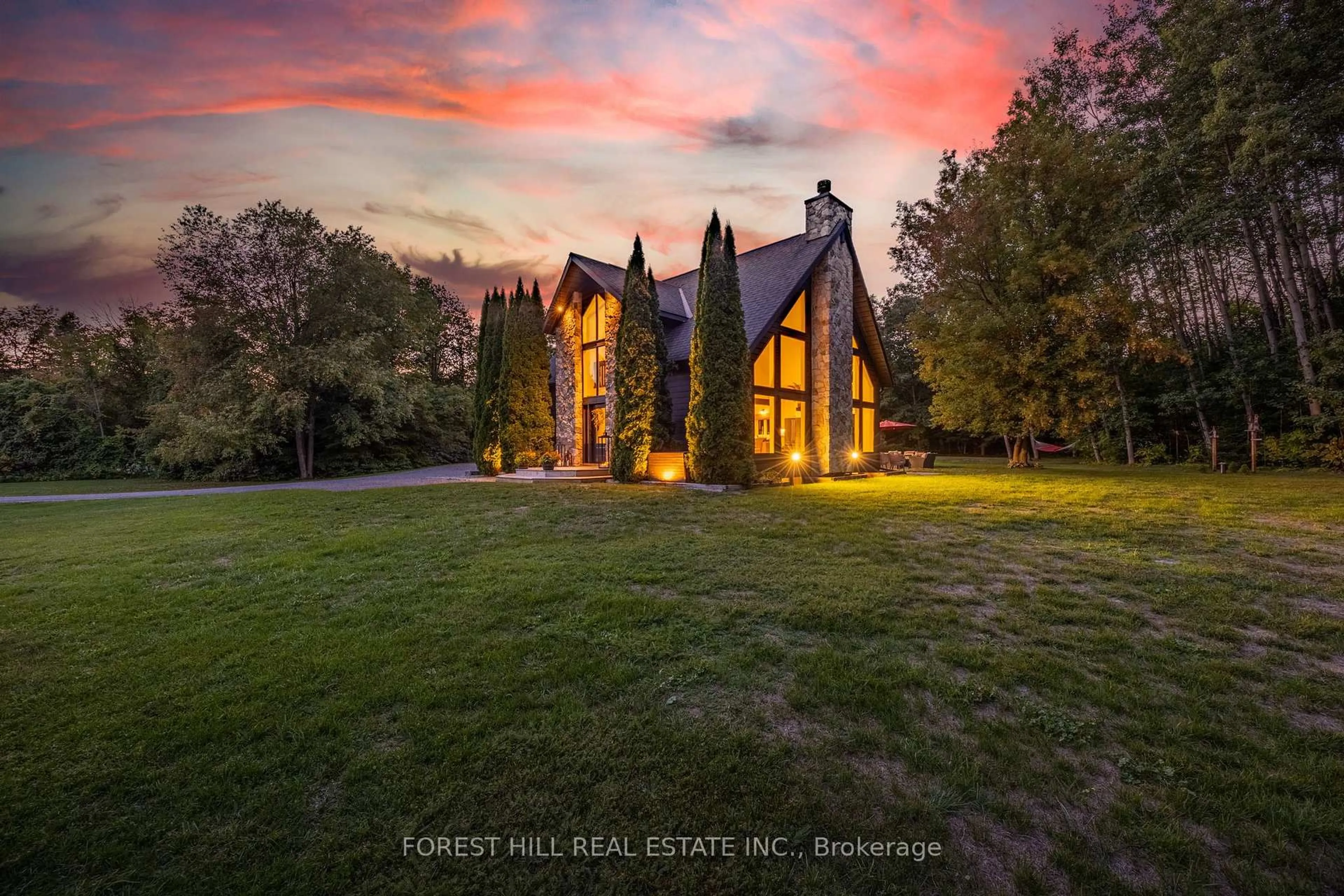 A pic from outside/outdoor area/front of a property/back of a property/a pic from drone, forest/trees view for 3328 Flos Road 6 Rd, Springwater Ontario L0L 2K0