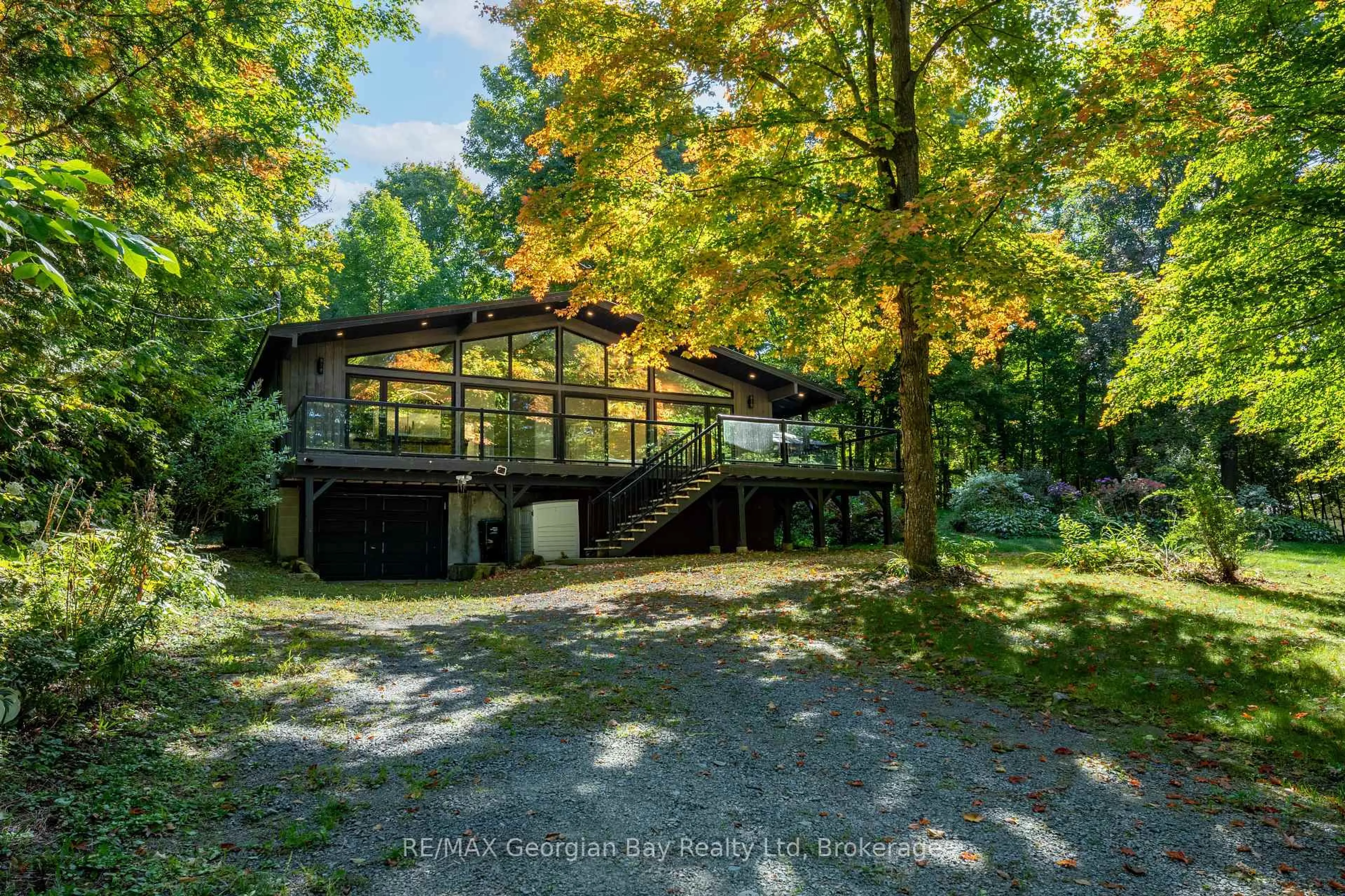 A pic from outside/outdoor area/front of a property/back of a property/a pic from drone, forest/trees view for 1745 Twin Oaks Cres, Severn Ontario L0K 1E0