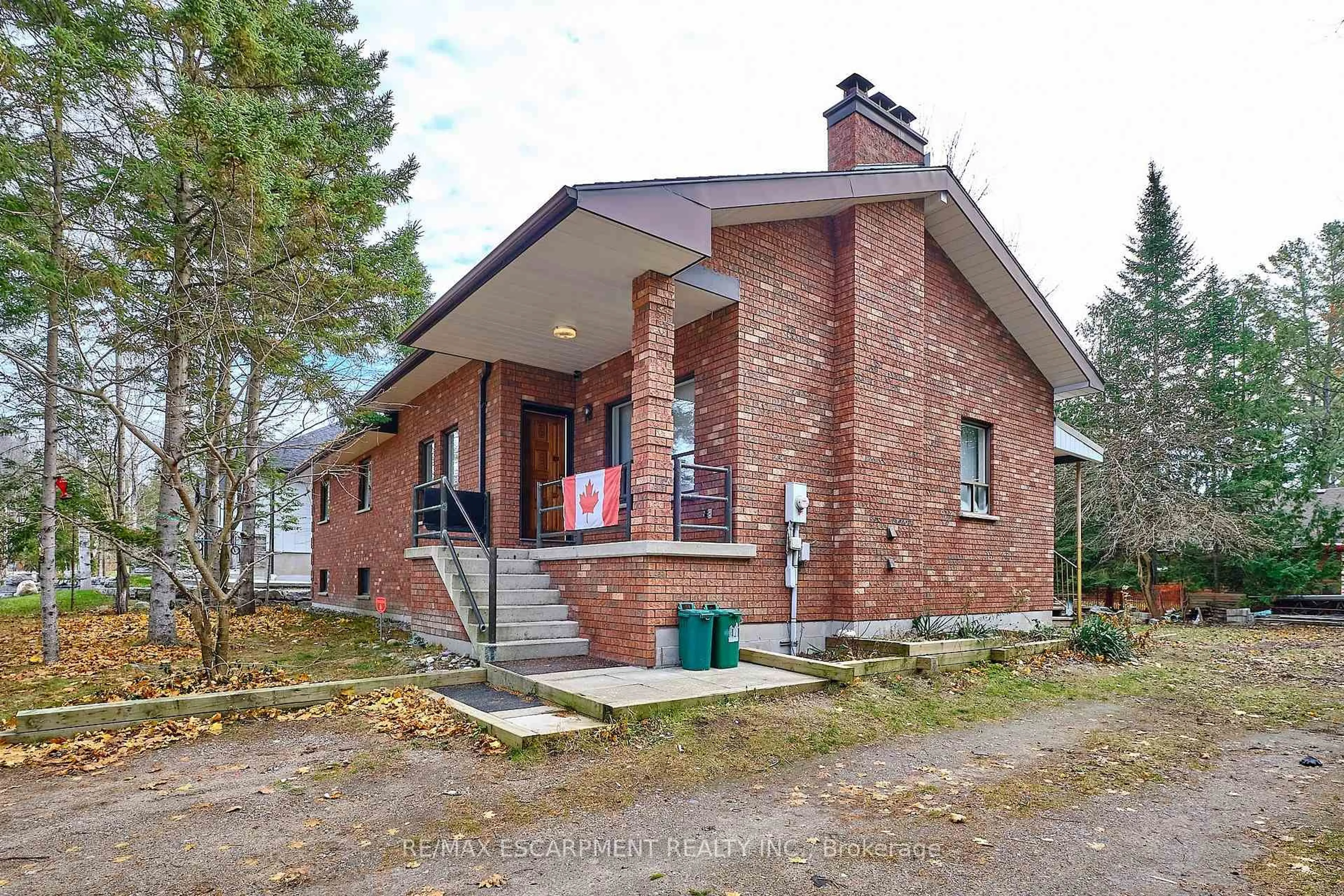 Home with brick exterior material, street for 13 Balsam Ave, Tiny Ontario L0L 2T0