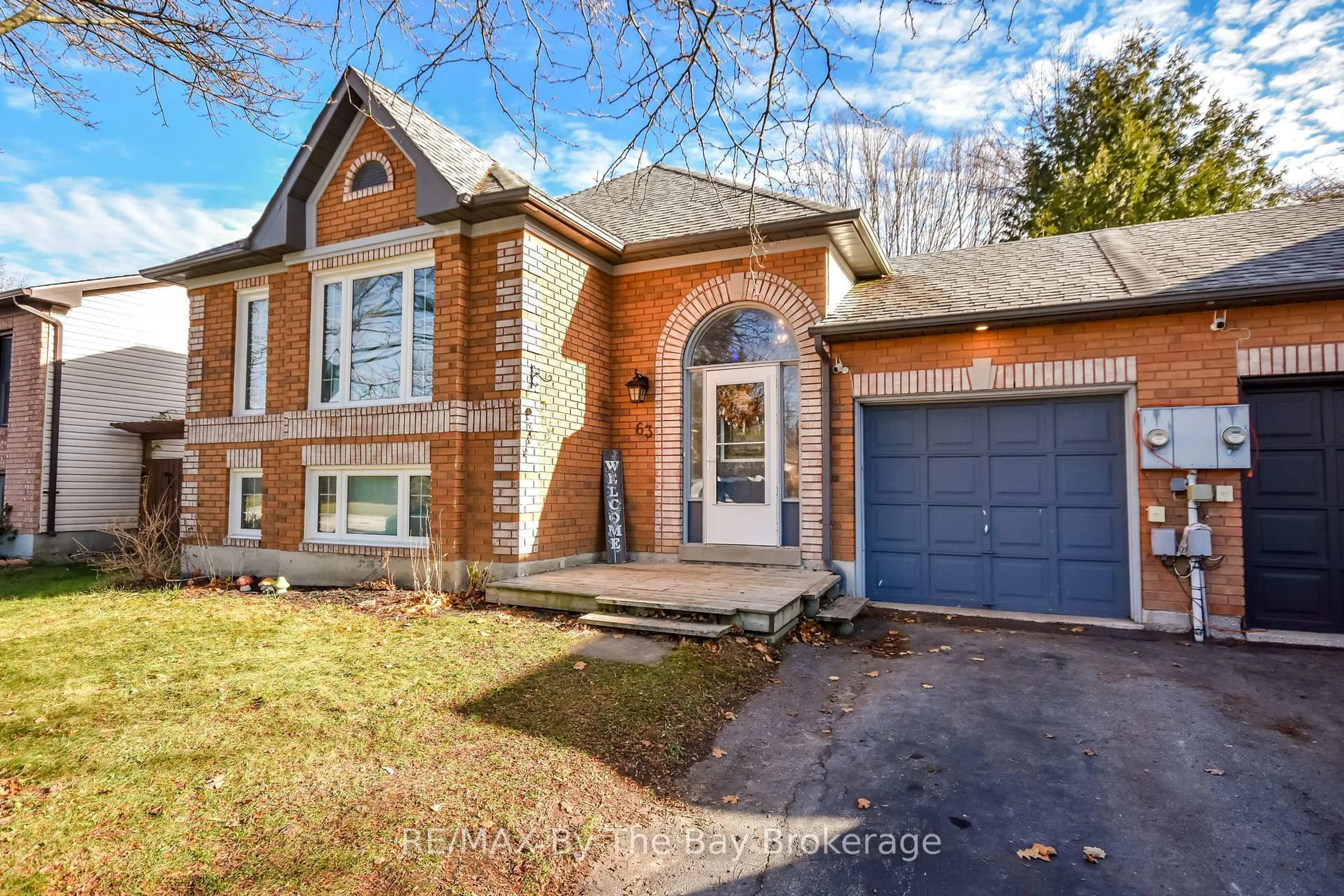 Home with brick exterior material, street for 63 Fernbrook Dr, Wasaga Beach Ontario L9Z 1G4