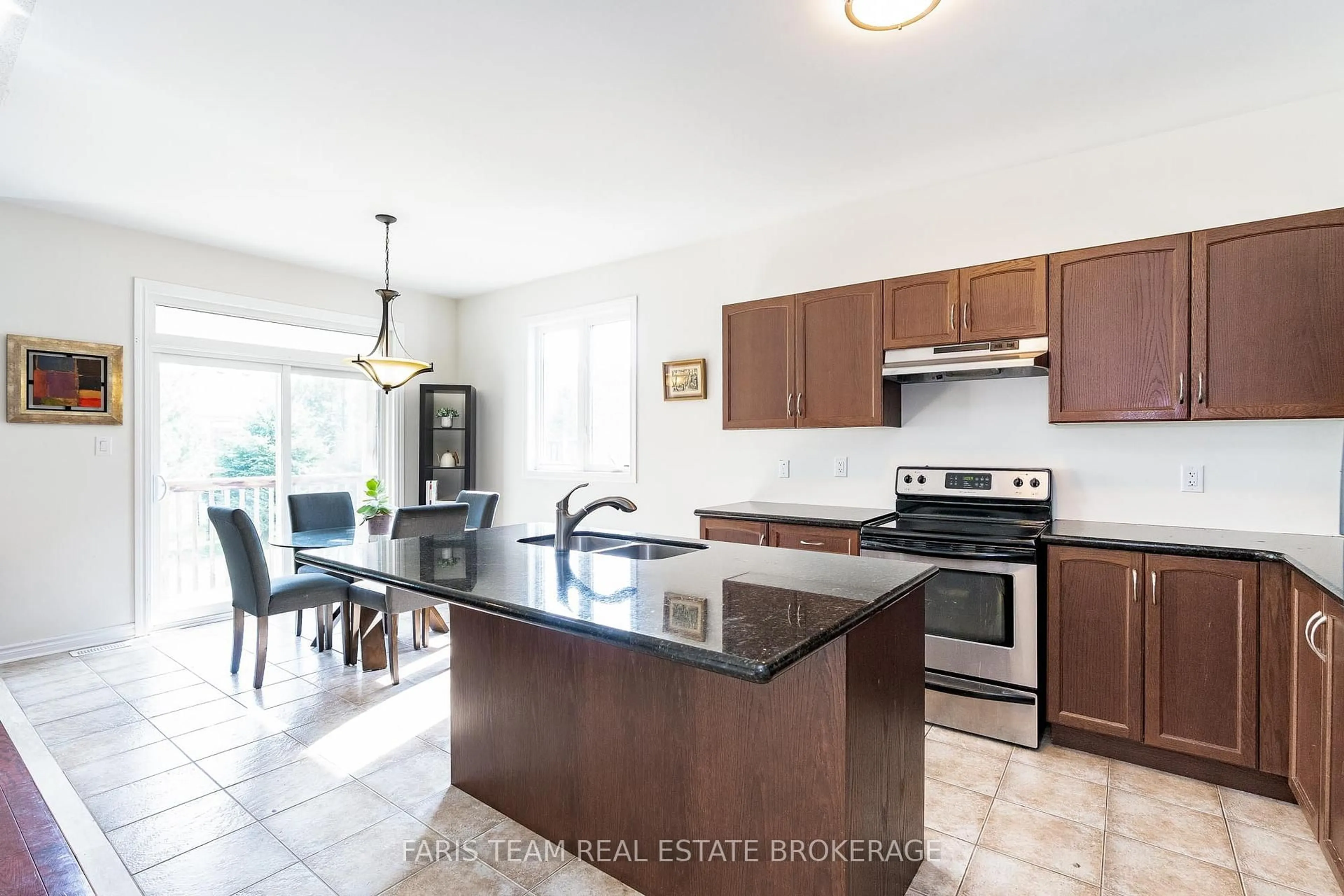 Open concept kitchen, ceramic/tile floor for 83 White Sands Way, Wasaga Beach Ontario L9Z 0E1