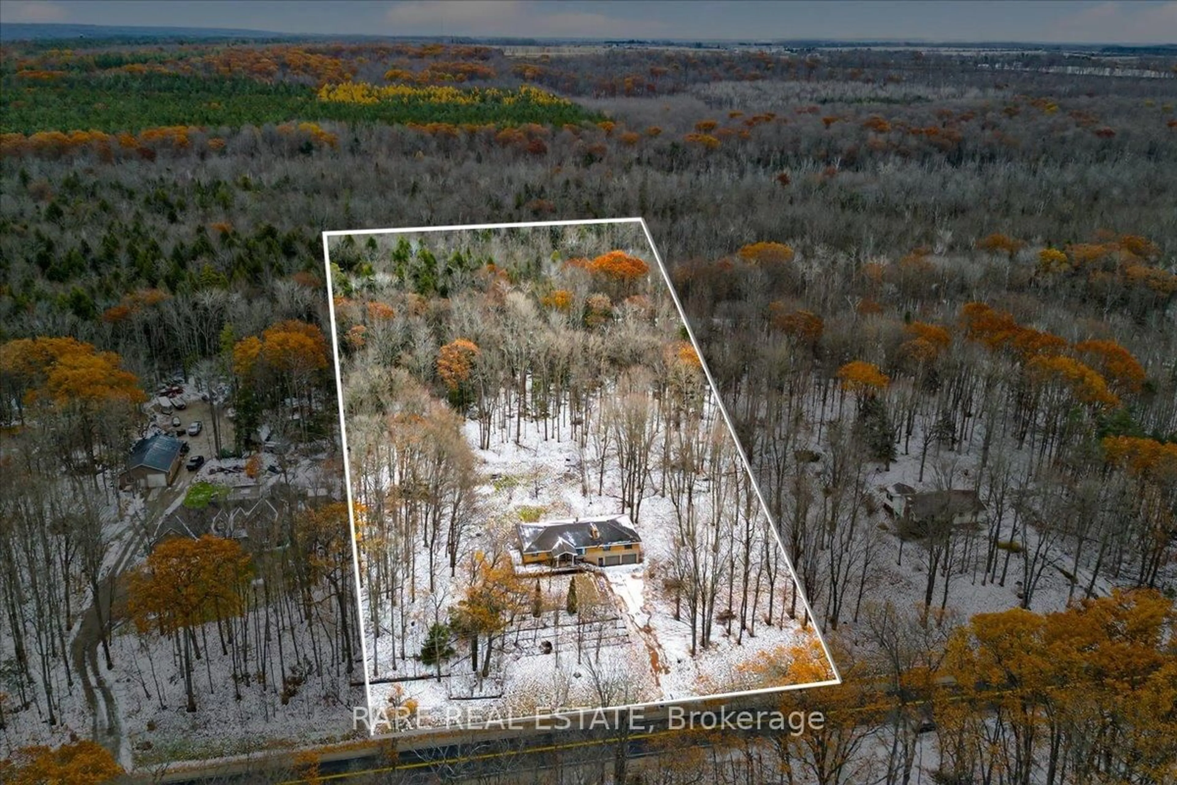 A pic from outside/outdoor area/front of a property/back of a property/a pic from drone, forest/trees view for 2211 South Orr Lake Rd, Springwater Ontario L0L 1P0