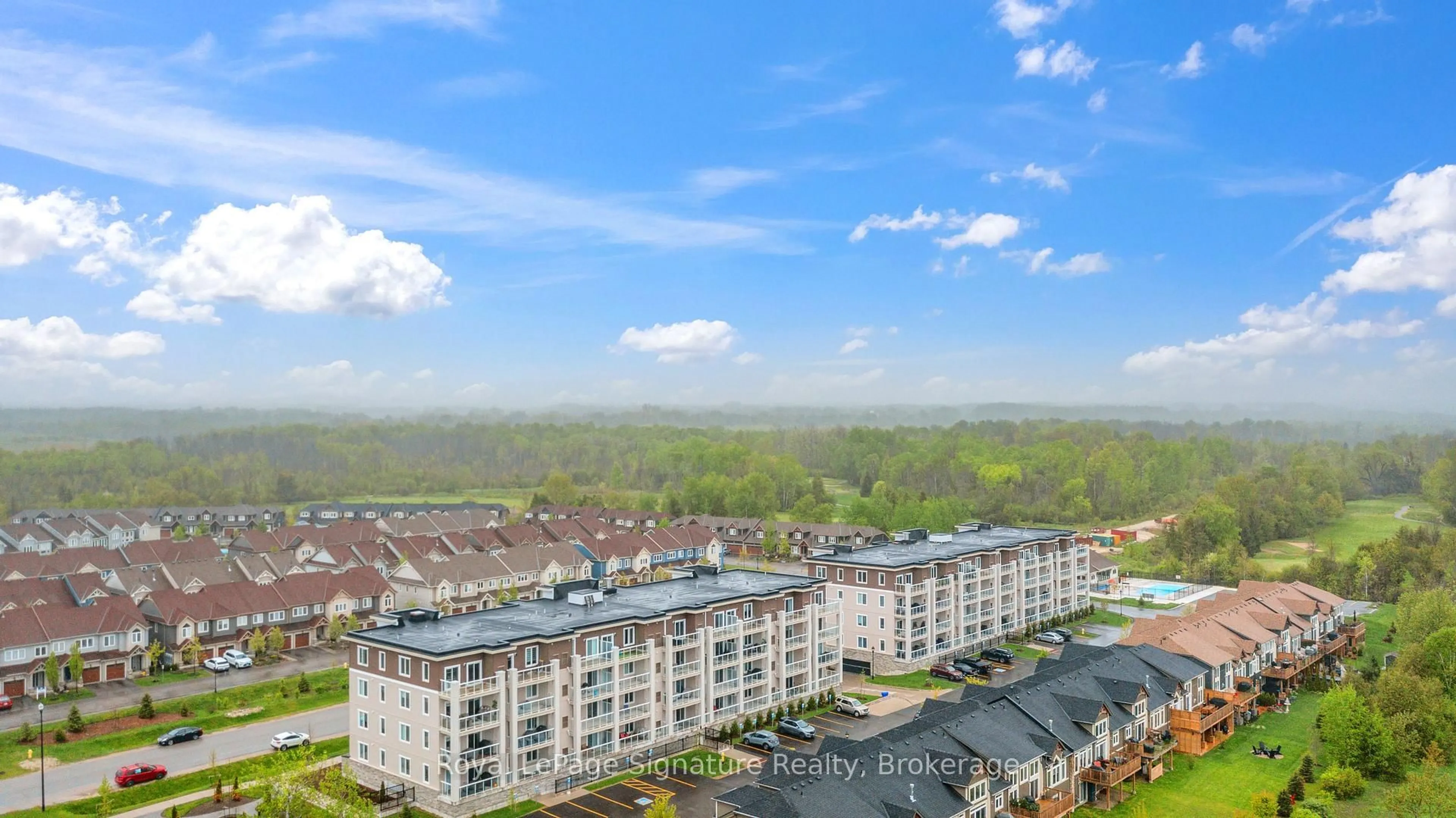 A pic from outside/outdoor area/front of a property/back of a property/a pic from drone, city buildings view from balcony for 17 Spooner Cres #102, Collingwood Ontario L9Y 1T3