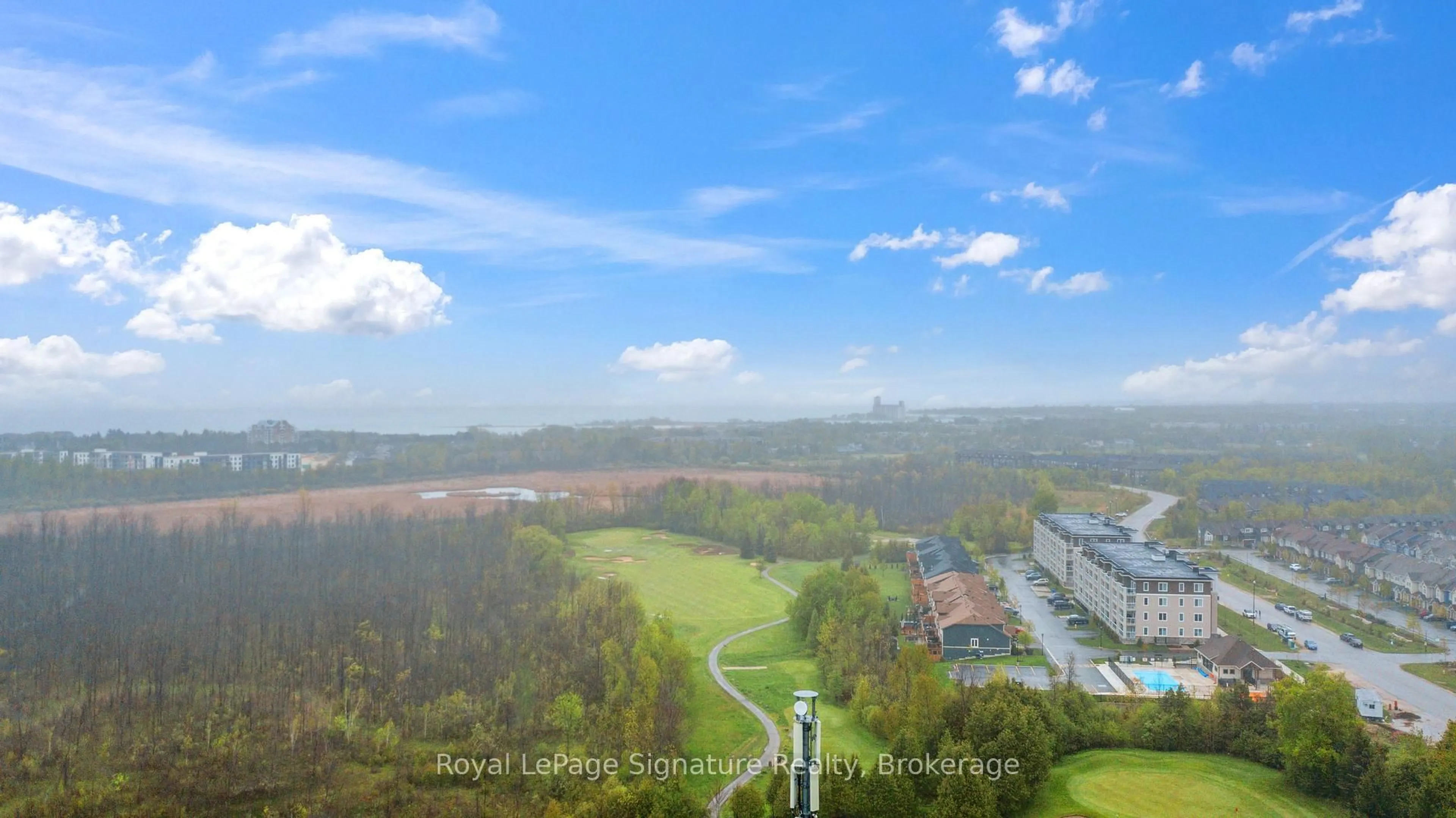 A pic from outside/outdoor area/front of a property/back of a property/a pic from drone, water/lake/river/ocean view for 17 Spooner Cres #102, Collingwood Ontario L9Y 1T3