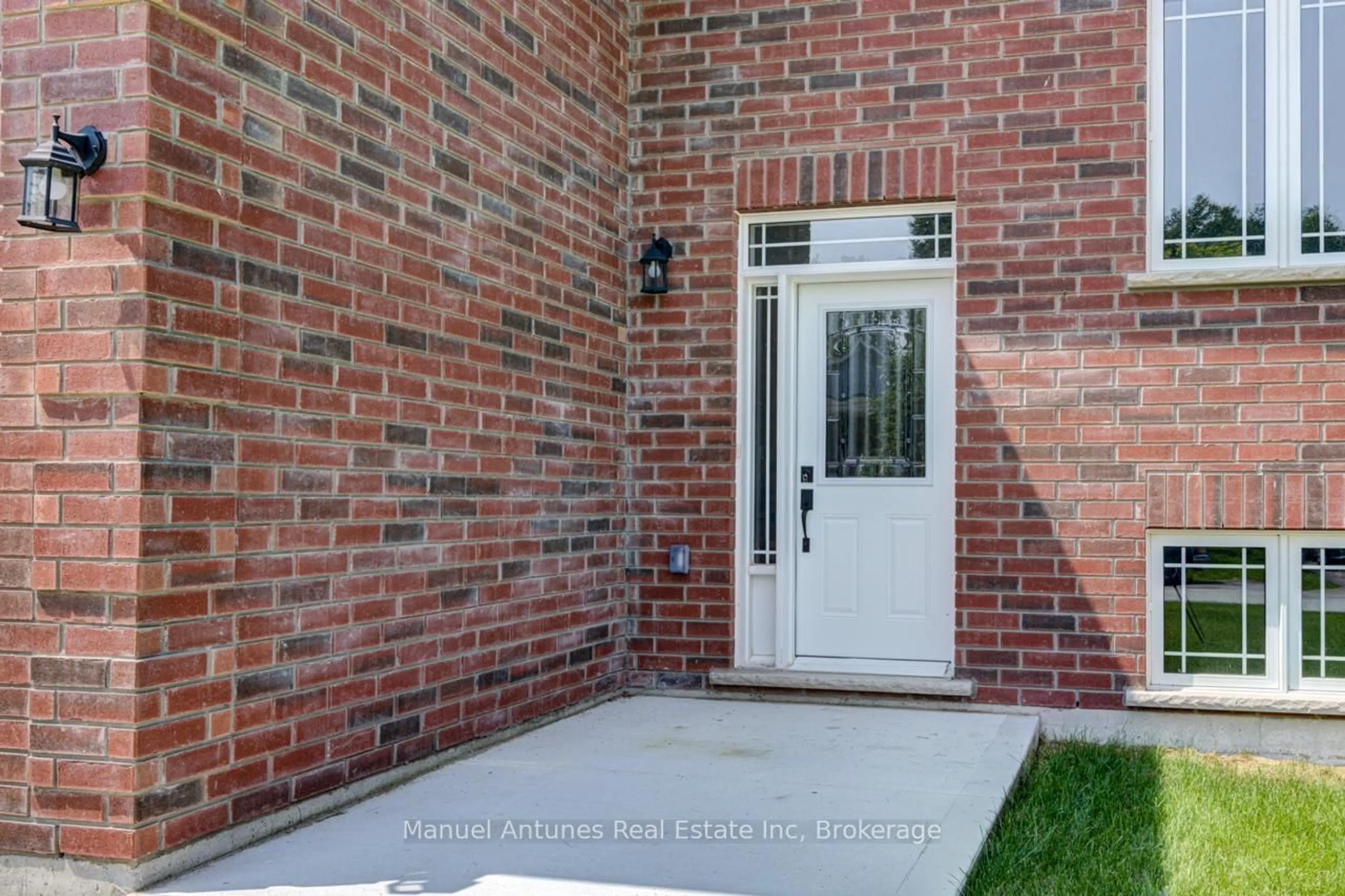 Home with brick exterior material, street for 14 56th St, Wasaga Beach Ontario L9Z 1W5