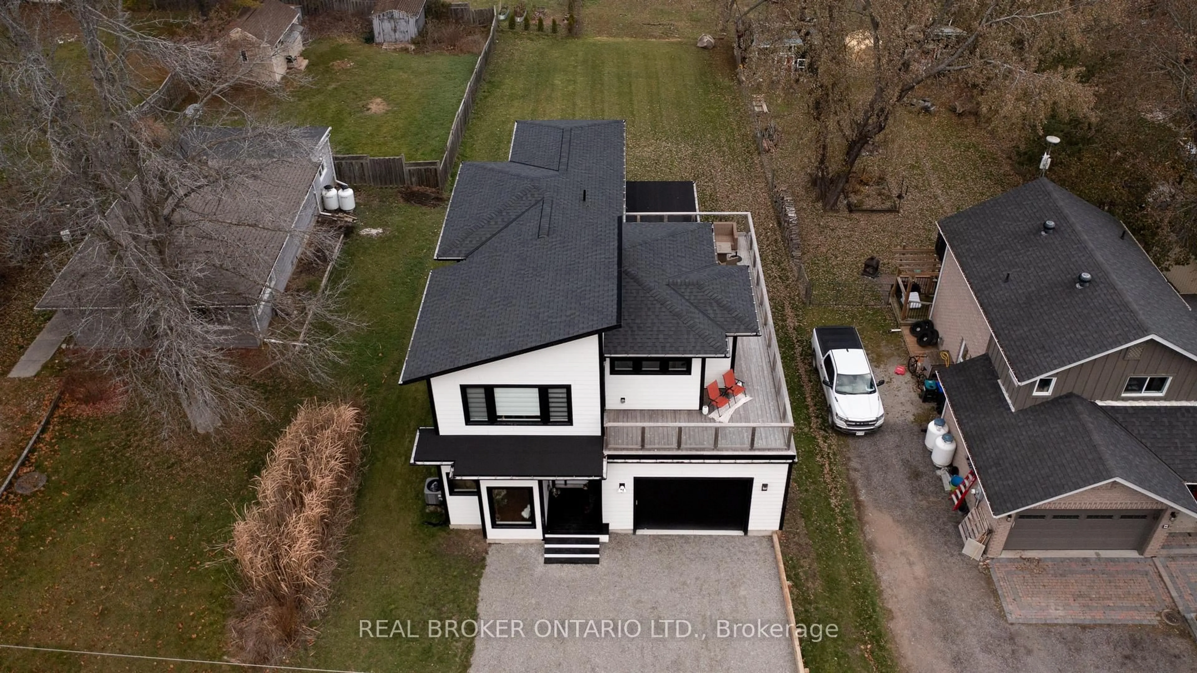 A pic from outside/outdoor area/front of a property/back of a property/a pic from drone, street for 3963 Hilltop Rd, Ramara Ontario L3V 0S2