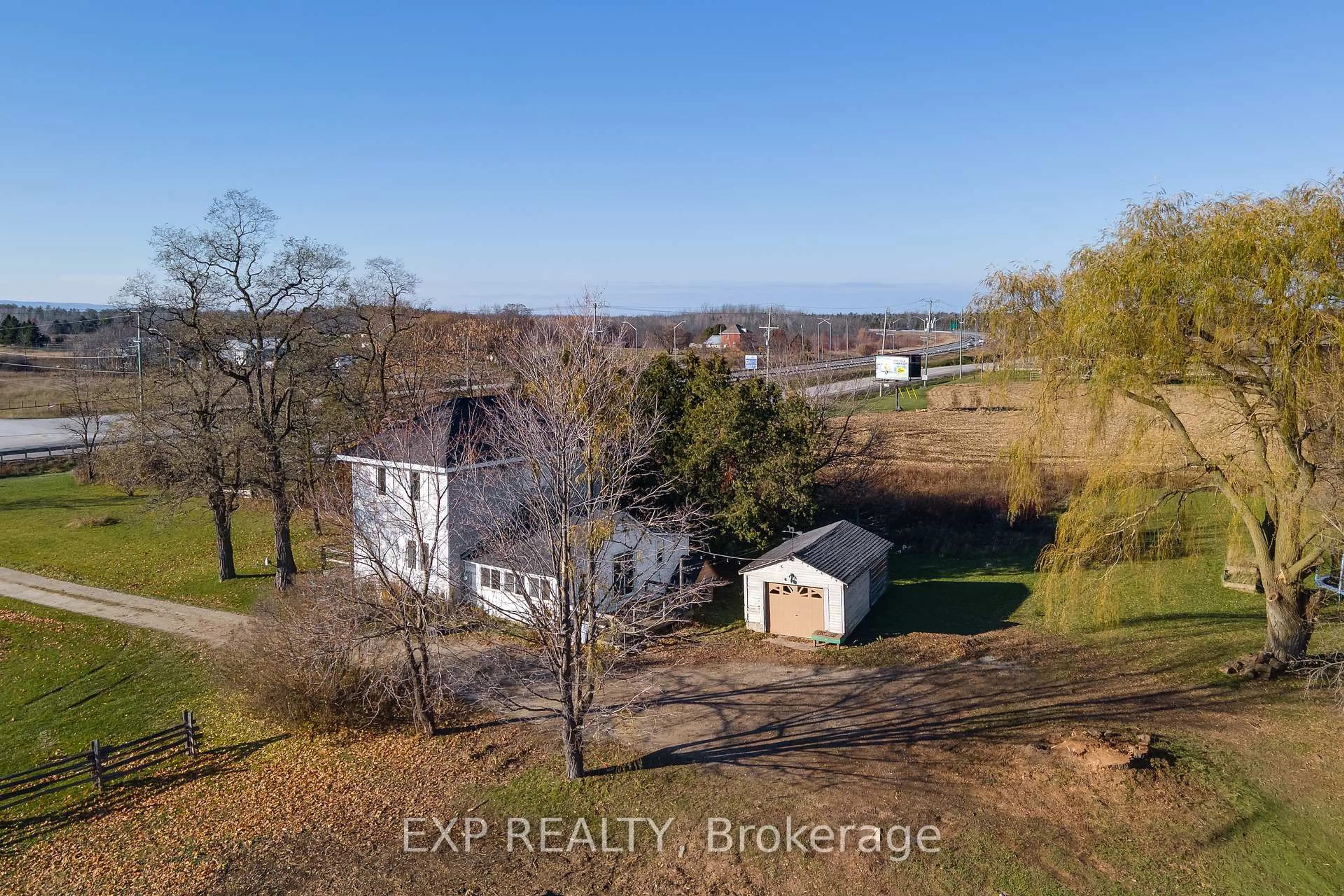 A pic from outside/outdoor area/front of a property/back of a property/a pic from drone, water/lake/river/ocean view for 8184 26 Highway, Clearview Ontario L0M 1S0