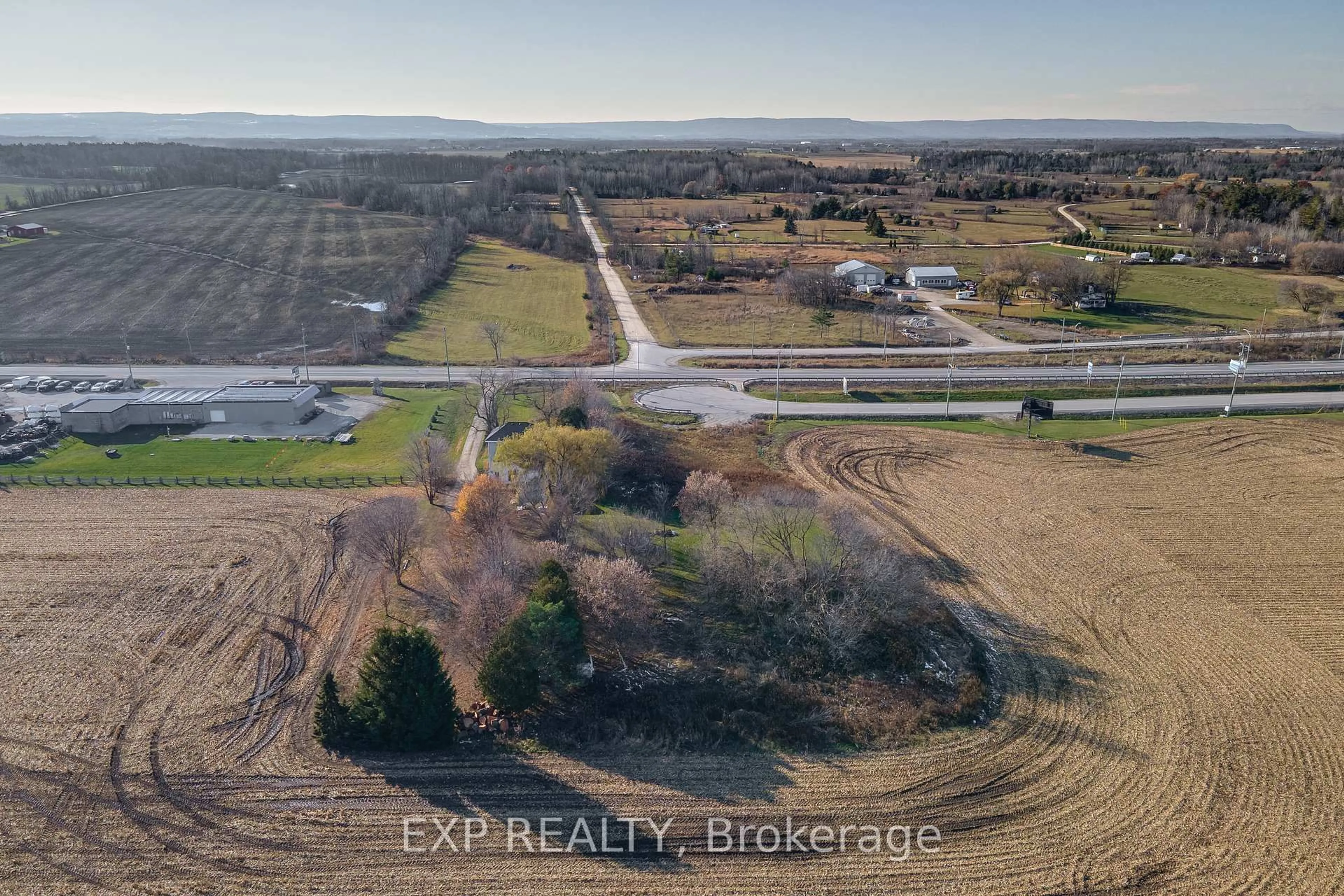 A pic from outside/outdoor area/front of a property/back of a property/a pic from drone, unknown for 8184 26 Highway, Clearview Ontario L0M 1S0