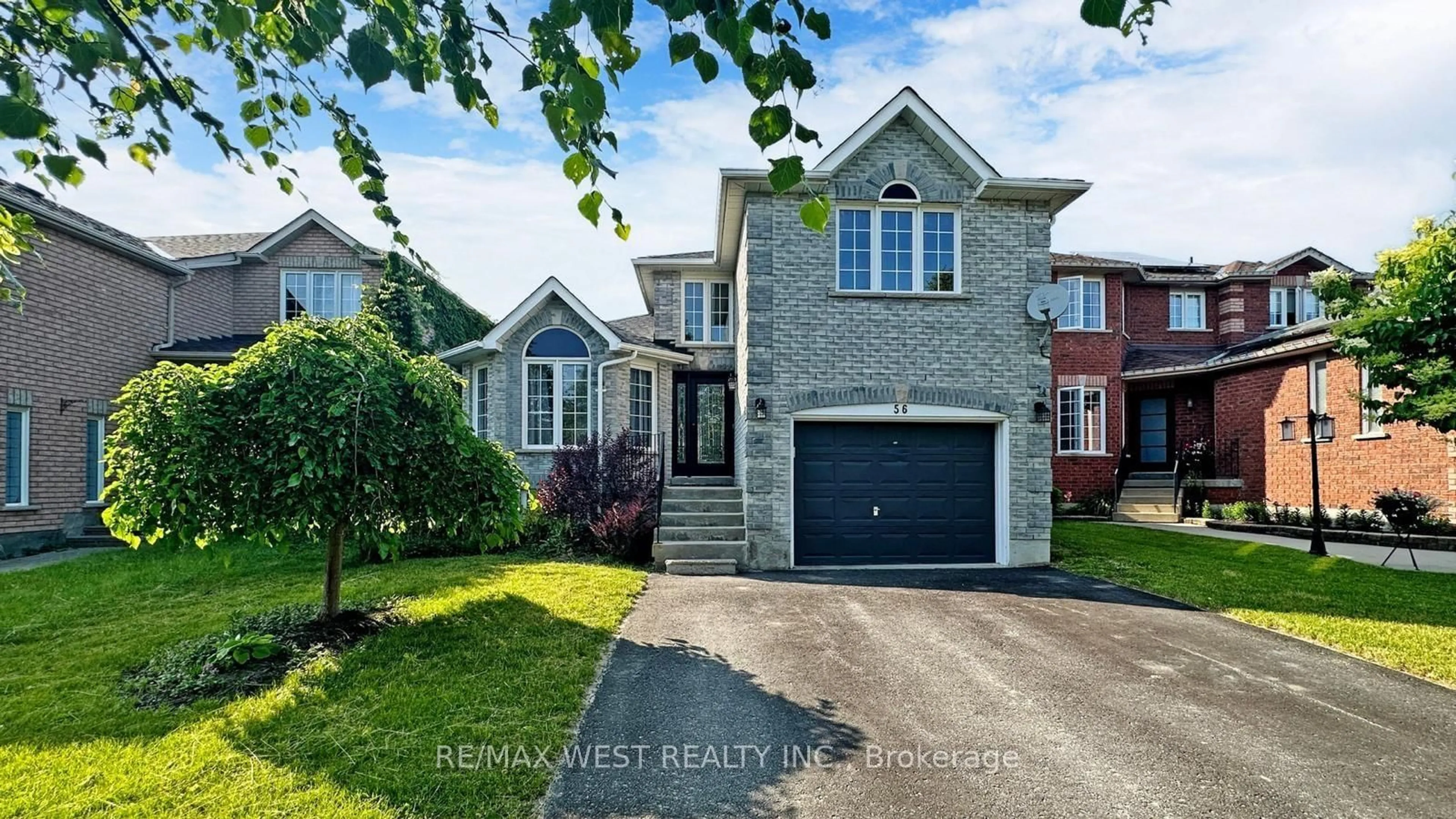 Home with brick exterior material, street for 56 Livia Herman Way, Barrie Ontario L4M 6X1