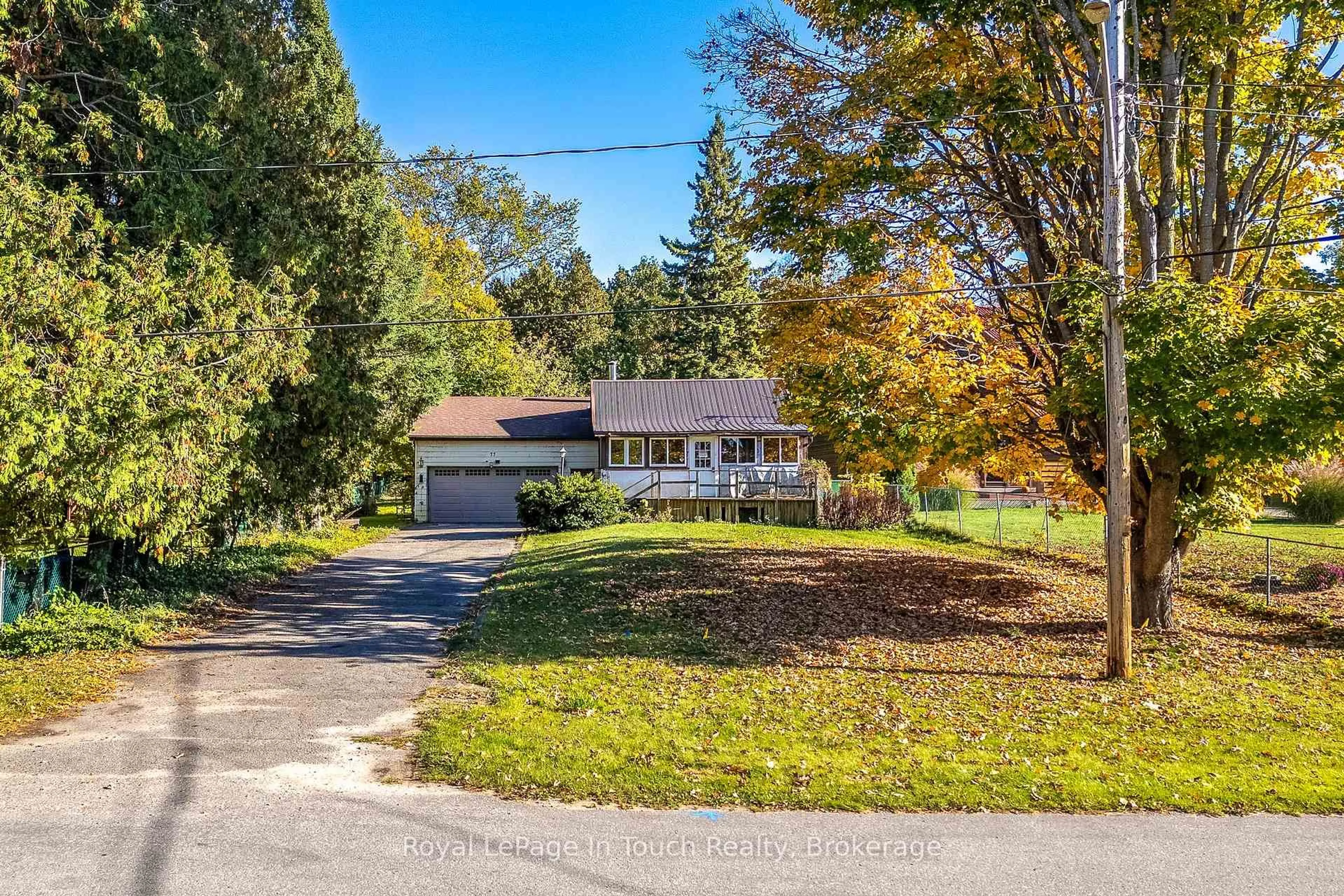 A pic from outside/outdoor area/front of a property/back of a property/a pic from drone, street for 77 King Rd, Tay Ontario L0K 2C0