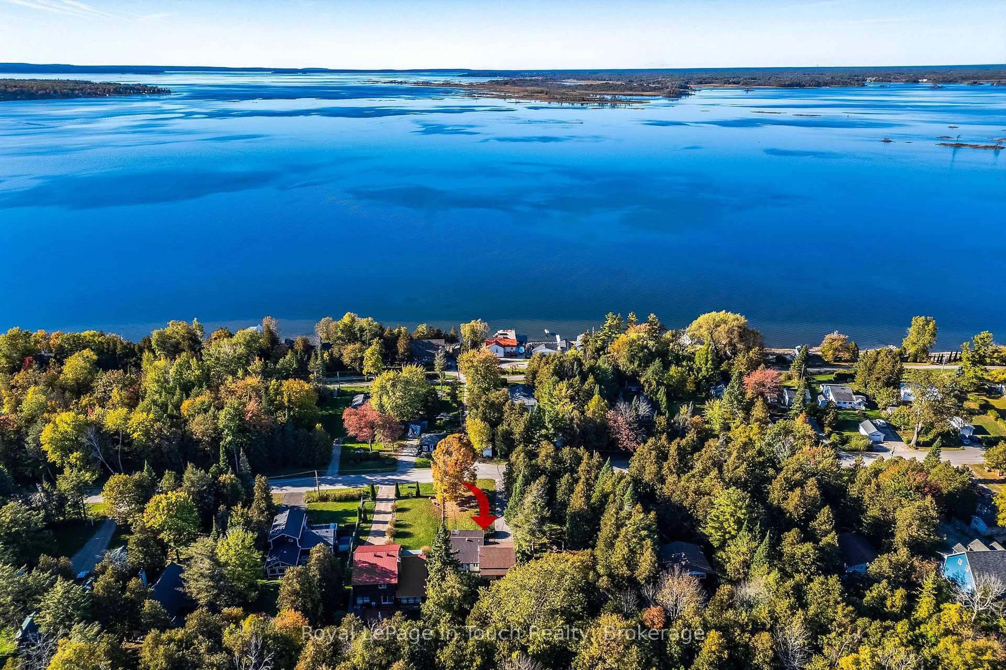 A pic from outside/outdoor area/front of a property/back of a property/a pic from drone, water/lake/river/ocean view for 77 King Rd, Tay Ontario L0K 2C0