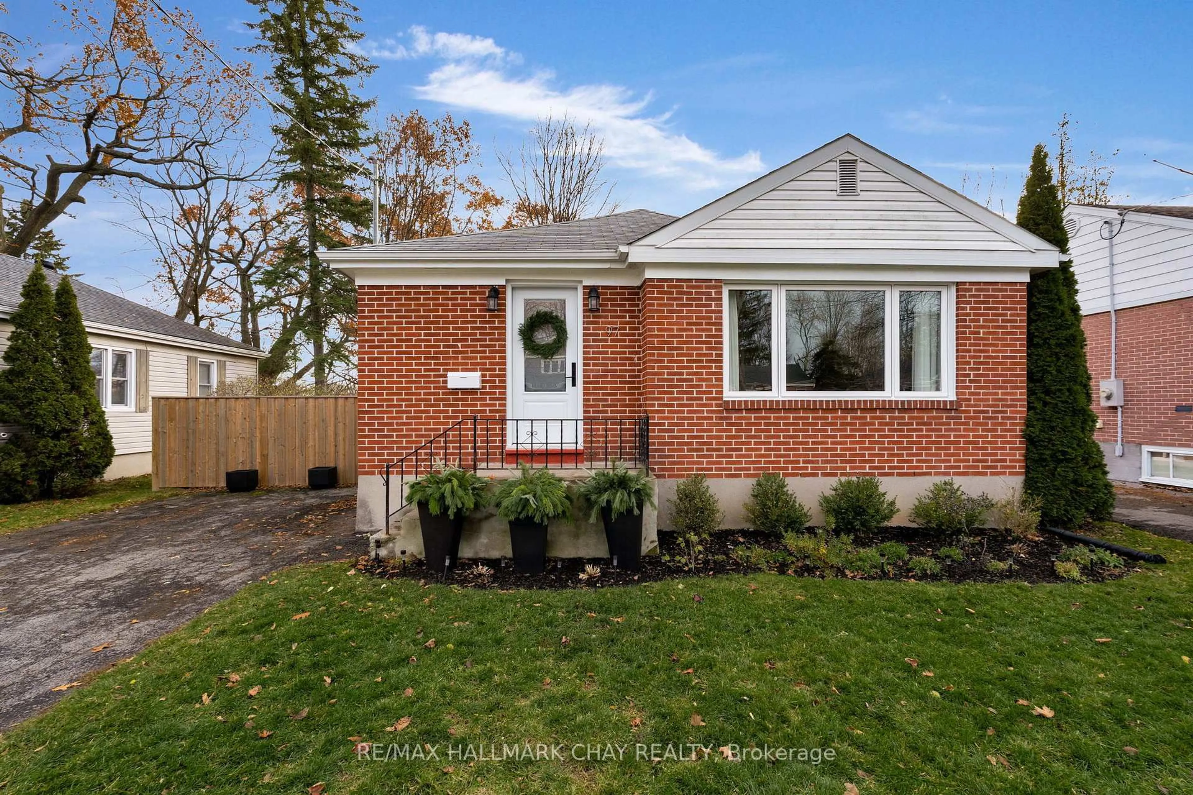 Home with brick exterior material, street for 97 Napier St, Barrie Ontario L4M 1W6
