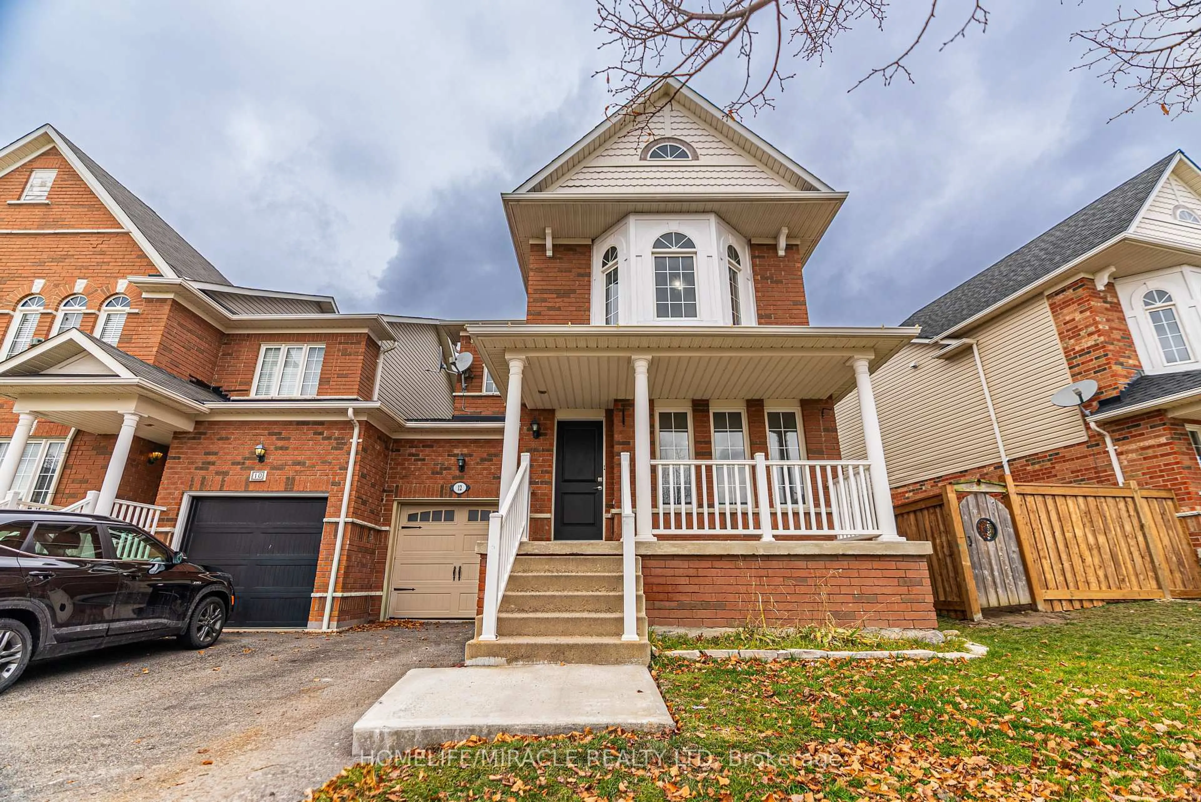 Home with brick exterior material, street for 12 Diana Way, Barrie Ontario L4M 7H2