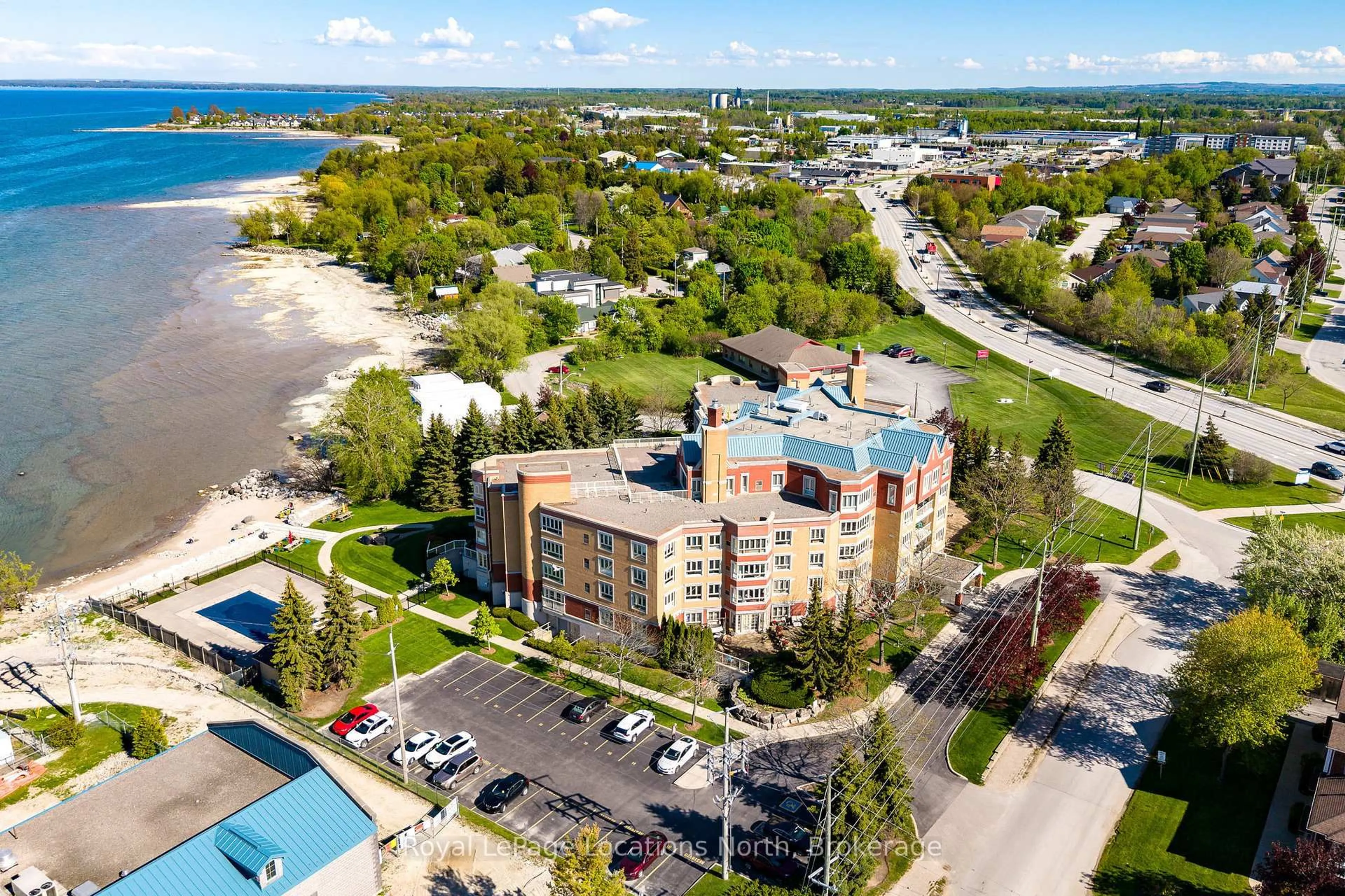 A pic from outside/outdoor area/front of a property/back of a property/a pic from drone, water/lake/river/ocean view for 16 Raglan St #404, Collingwood Ontario L9Y 4Y2