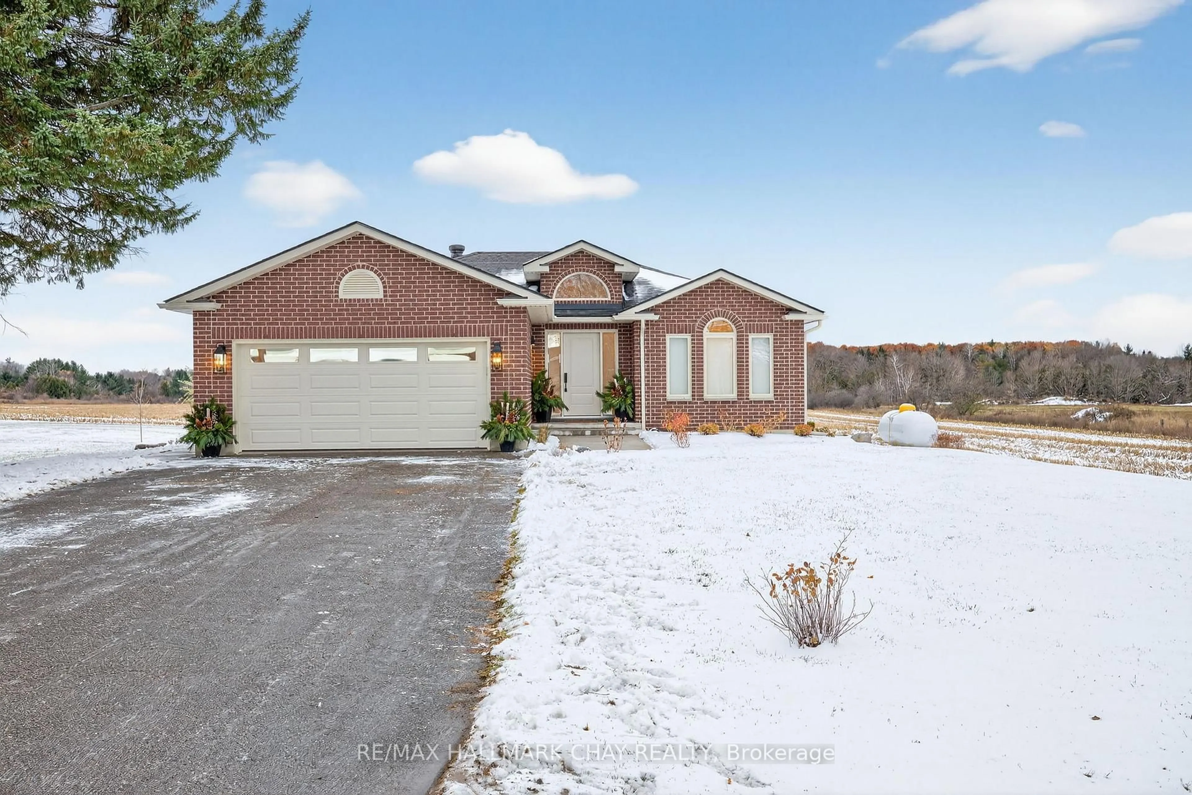 Home with brick exterior material, street for 930 Marshall Rd, Tiny Ontario L0K 2E1