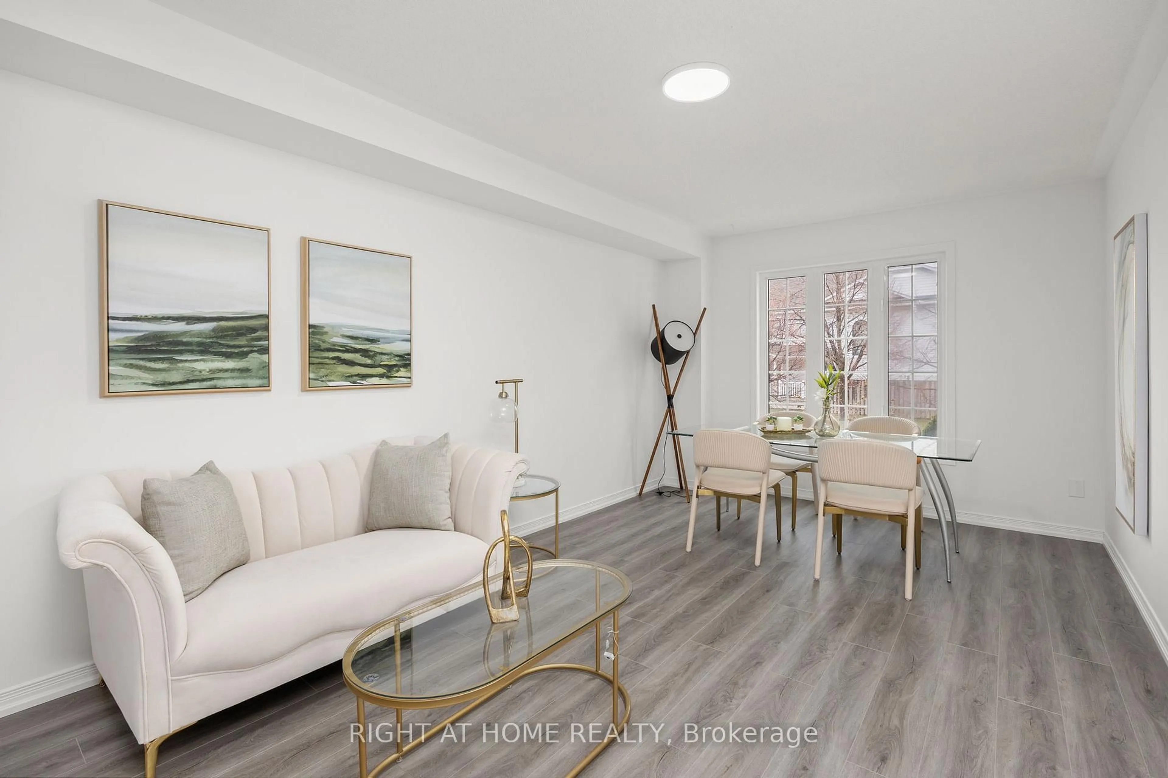 Living room with furniture, wood/laminate floor for 8 Diana Way, Barrie Ontario L4M 7H2