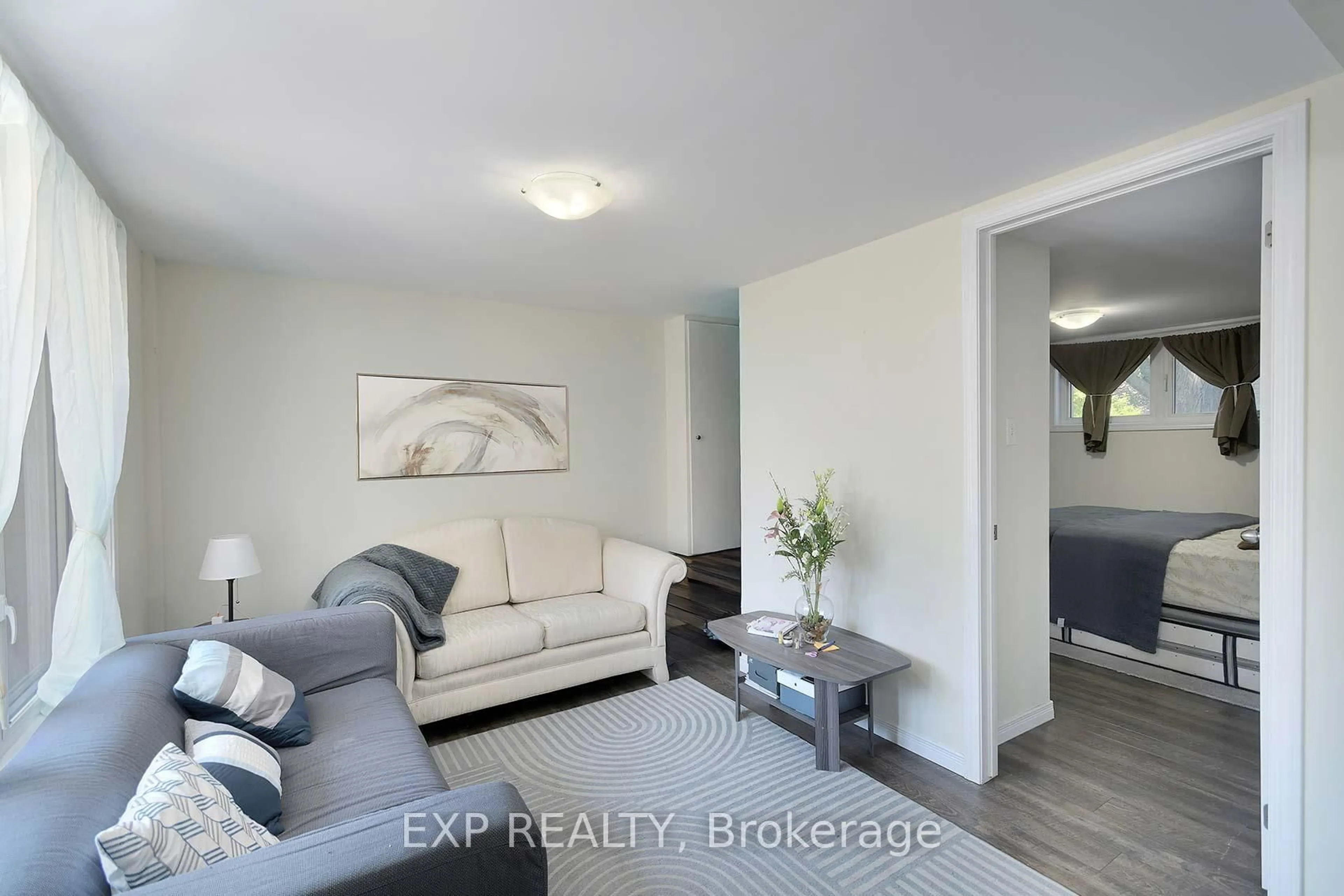 Living room with furniture, unknown for 2 Roslyn Rd, Barrie Ontario L4M 2X6