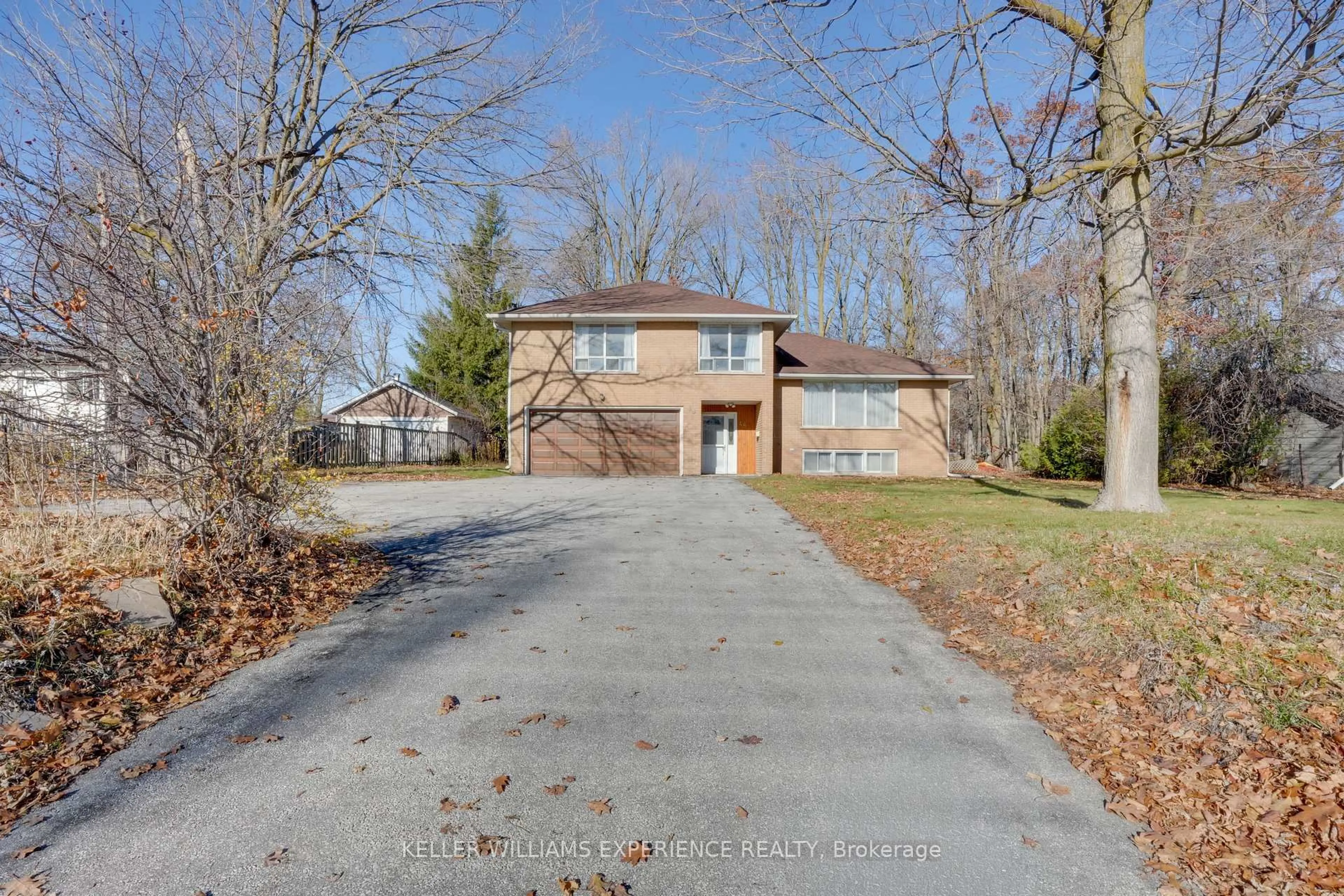 Home with brick exterior material, street for 48 Cundles Rd, Barrie Ontario L4M 2Z7