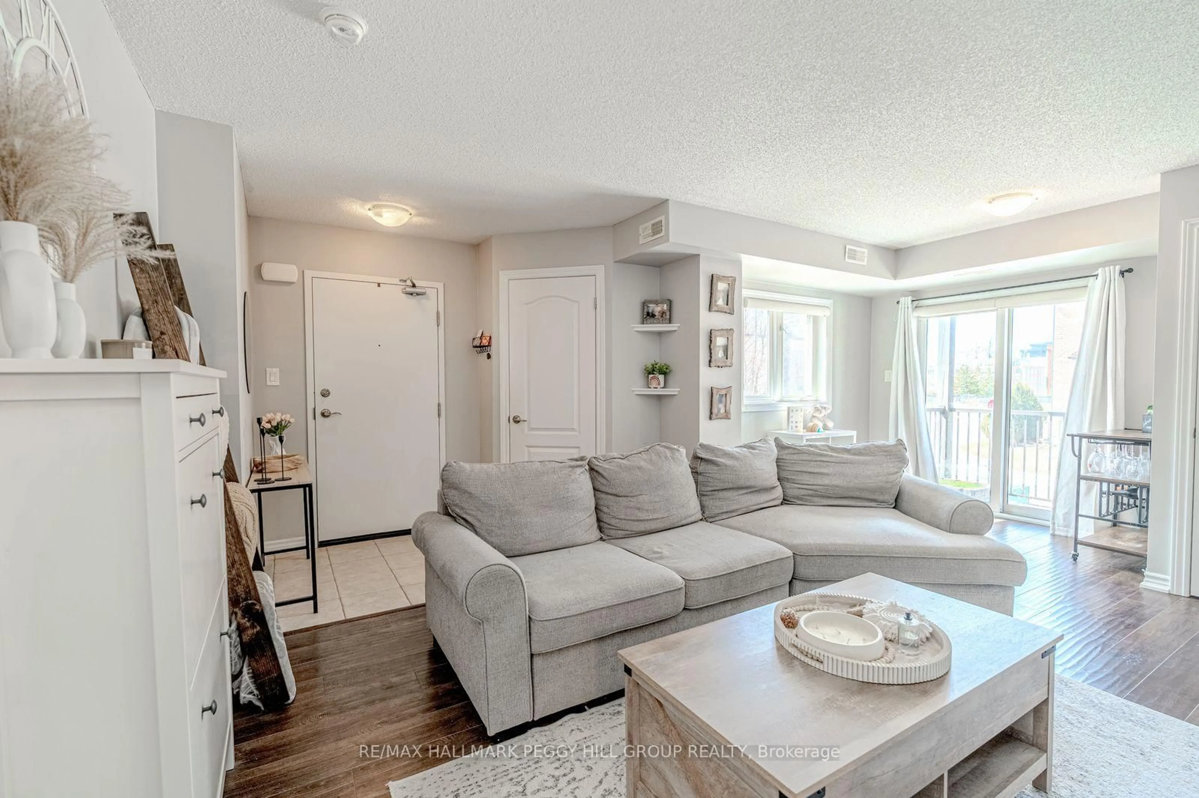 Living room with furniture, unknown for 25 Madelaine Dr #7, Barrie Ontario L9J 0G8