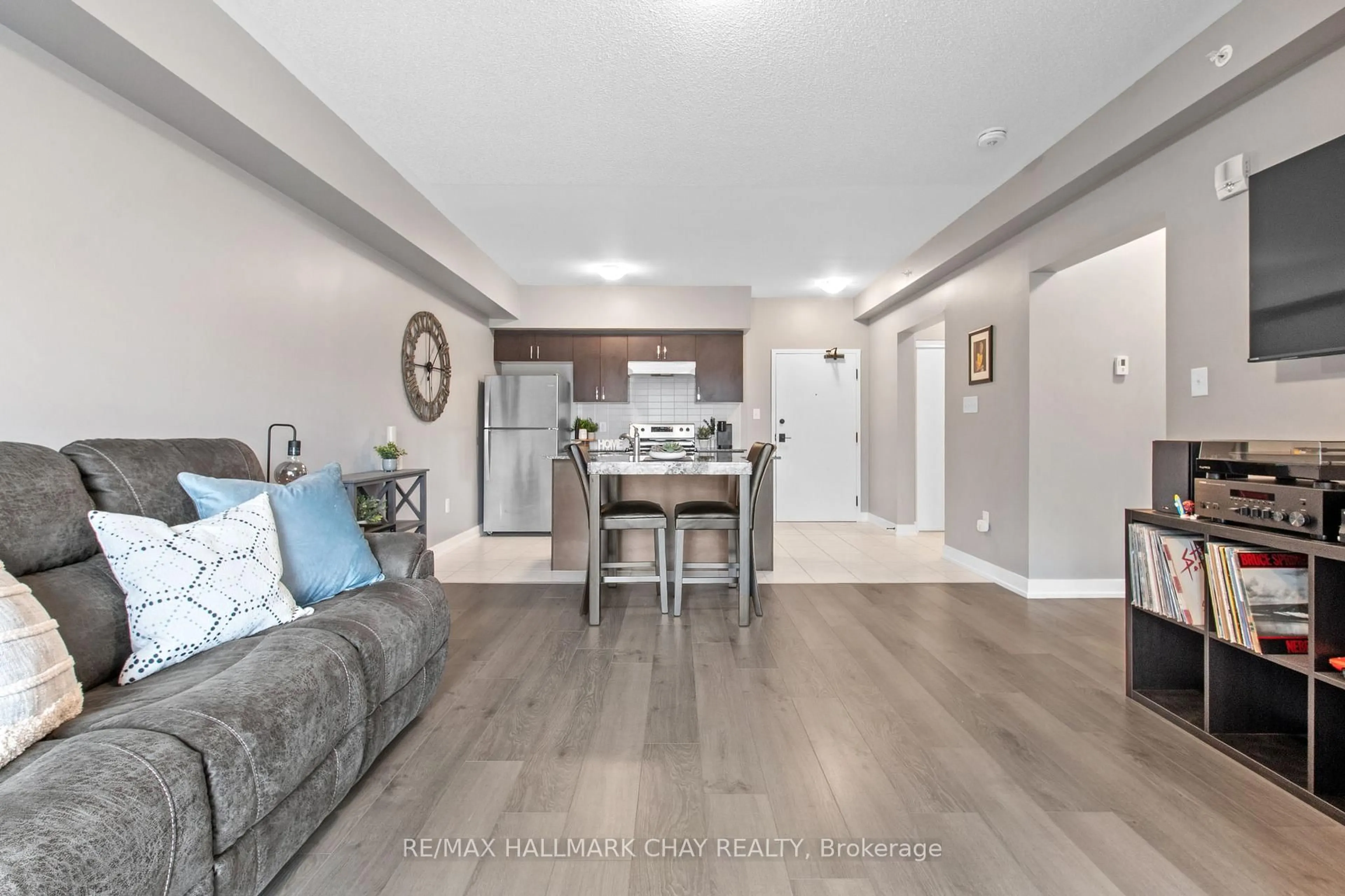 Living room with furniture, unknown for 4 Spice Way #211, Barrie Ontario L9J 0M2