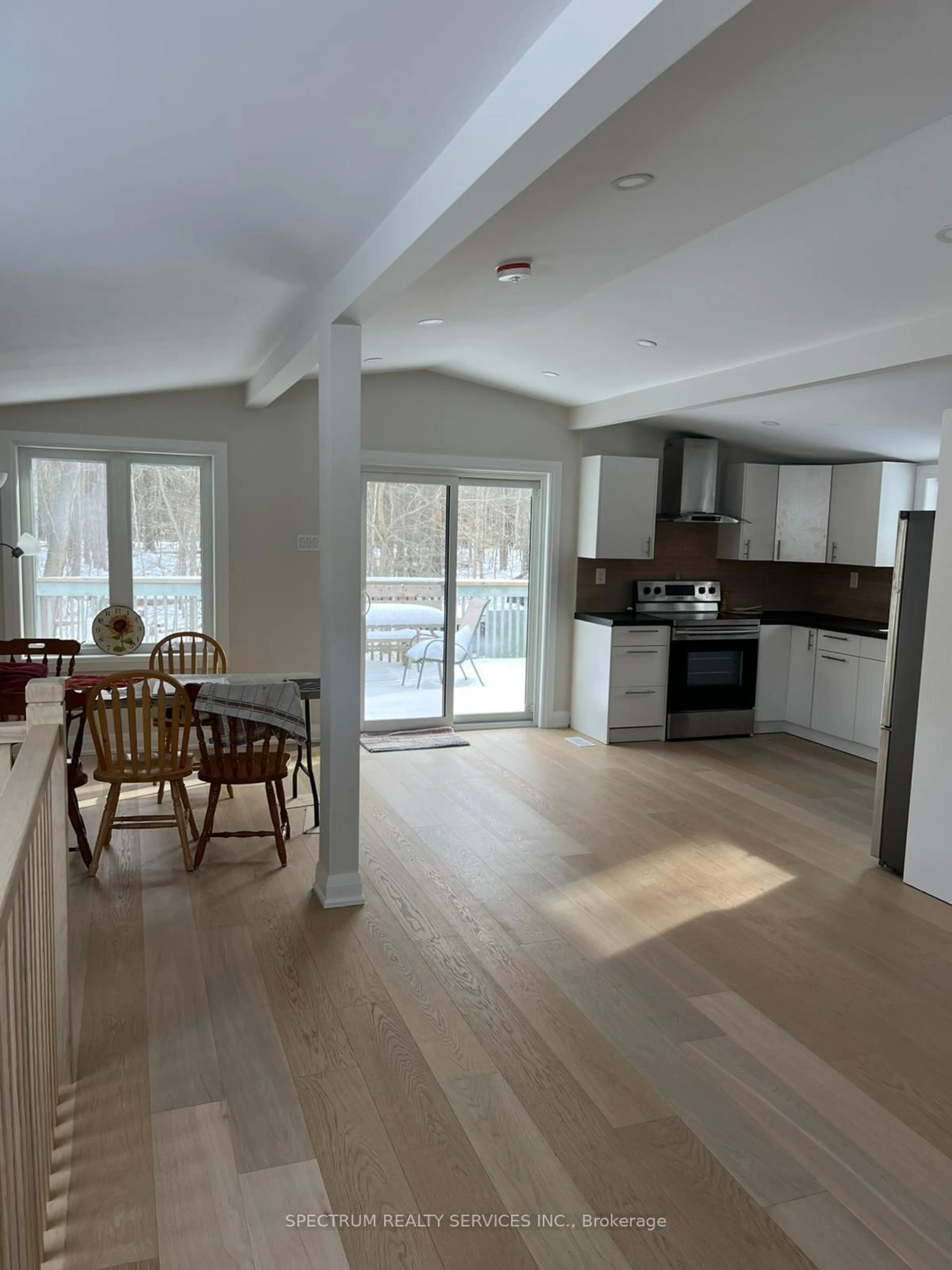 Open concept kitchen, wood/laminate floor for 161 Antigua Dr, Wasaga Beach Ontario L9Z 2S2