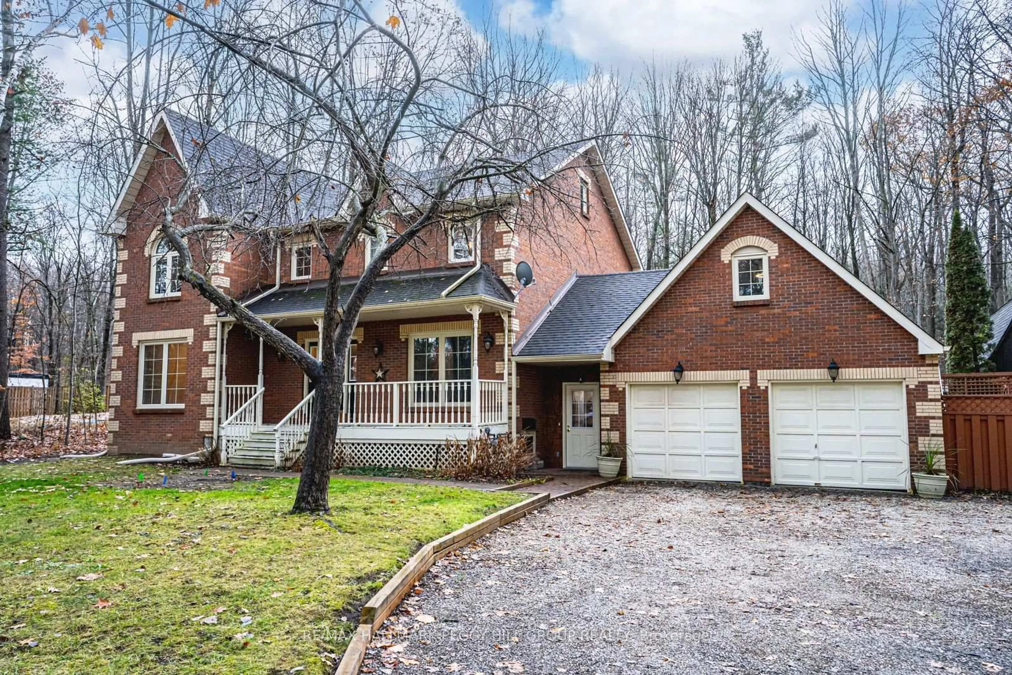 Home with brick exterior material, street for 1311 Snow Valley Rd, Springwater Ontario L9X 1K2