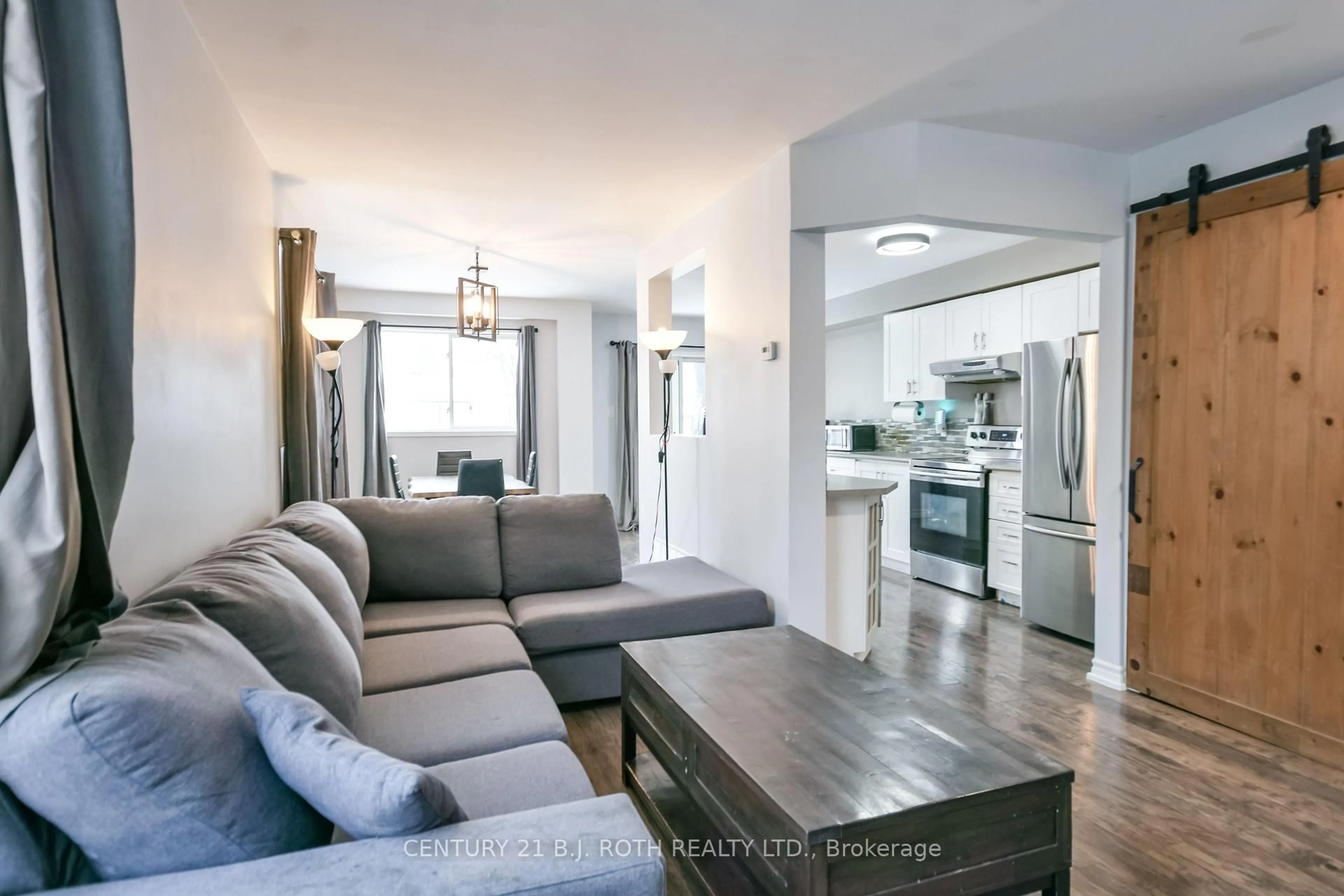 Living room with furniture, unknown for 5 Black Cherry Cres, Barrie Ontario L4N 9K9