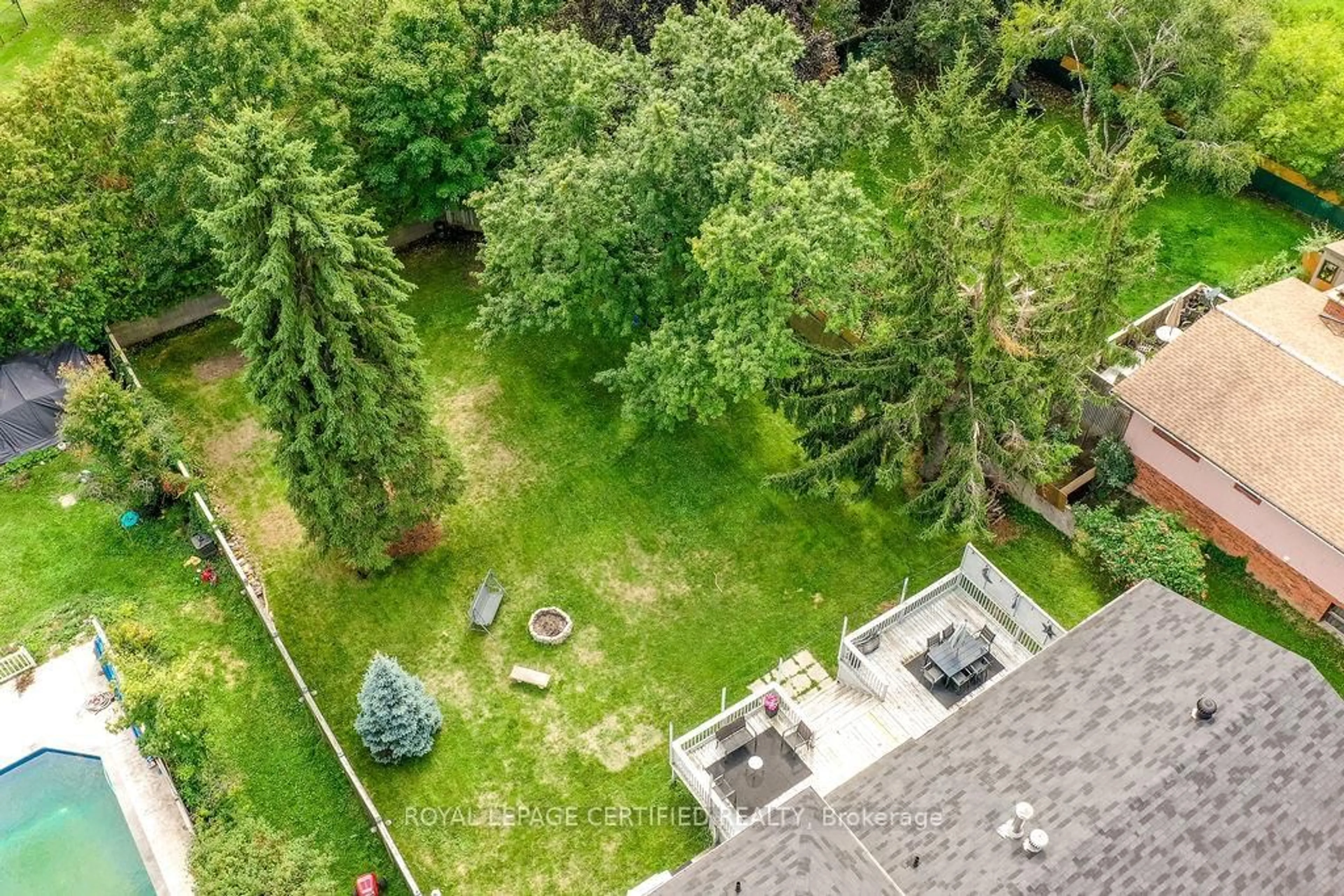 A pic from outside/outdoor area/front of a property/back of a property/a pic from drone, forest/trees view for 605 Big Bay Point Rd, Barrie Ontario L4N 3Z9