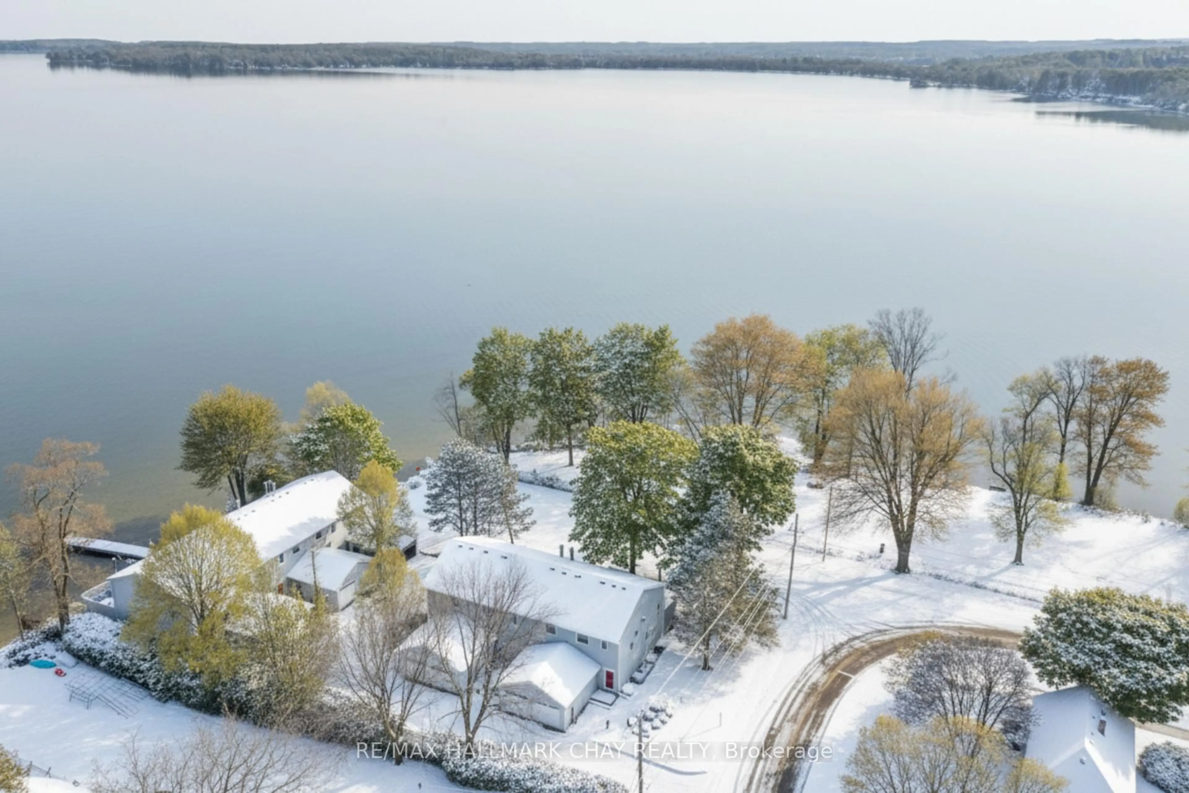 A pic from outside/outdoor area/front of a property/back of a property/a pic from drone, water/lake/river/ocean view for 1 Olive Cres #4, Orillia Ontario L3V 7N5