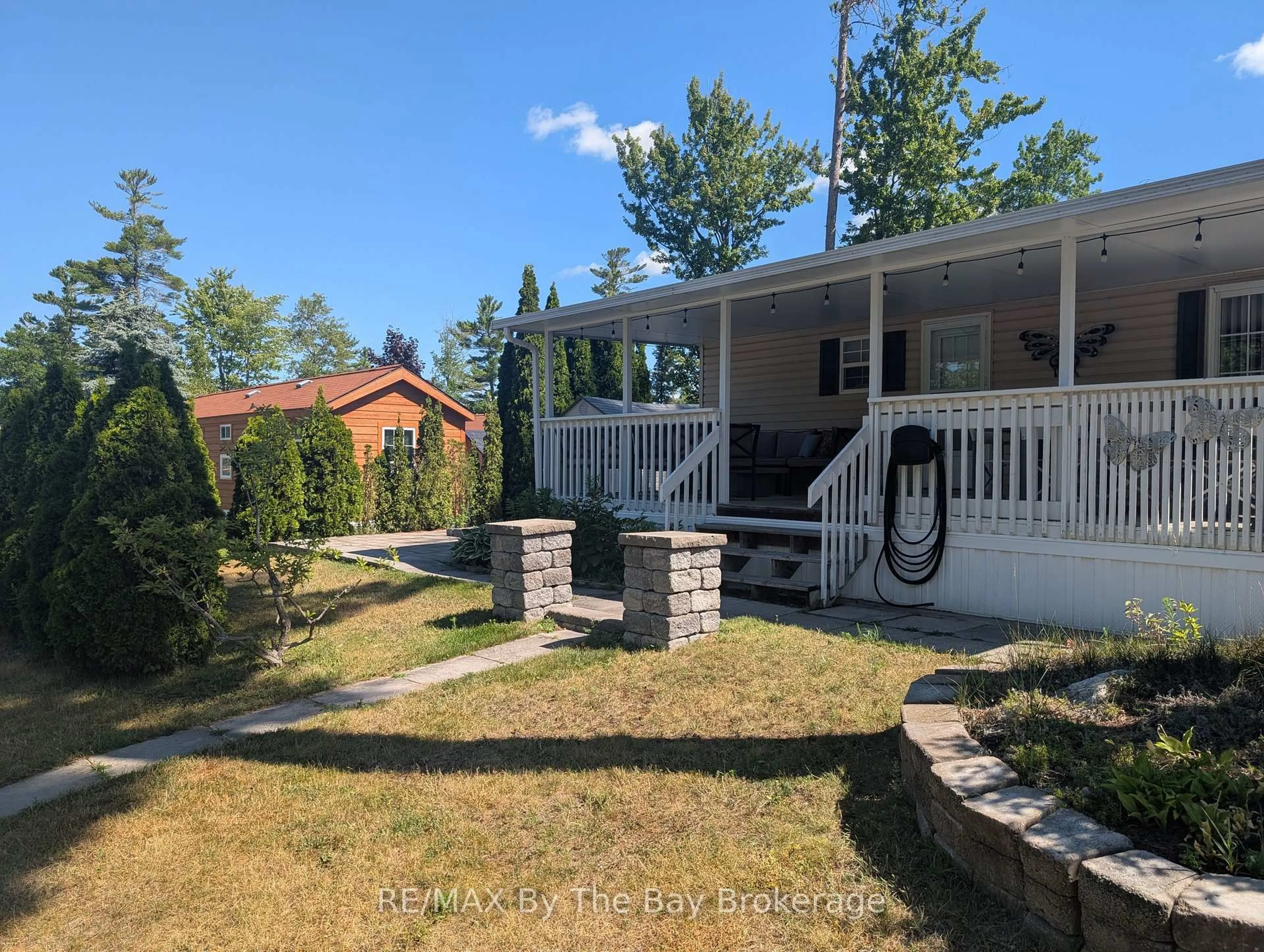 A pic from outside/outdoor area/front of a property/back of a property/a pic from drone, unknown for 2 WHITE PINES Tr, Wasaga Beach Ontario L9Z 1X7