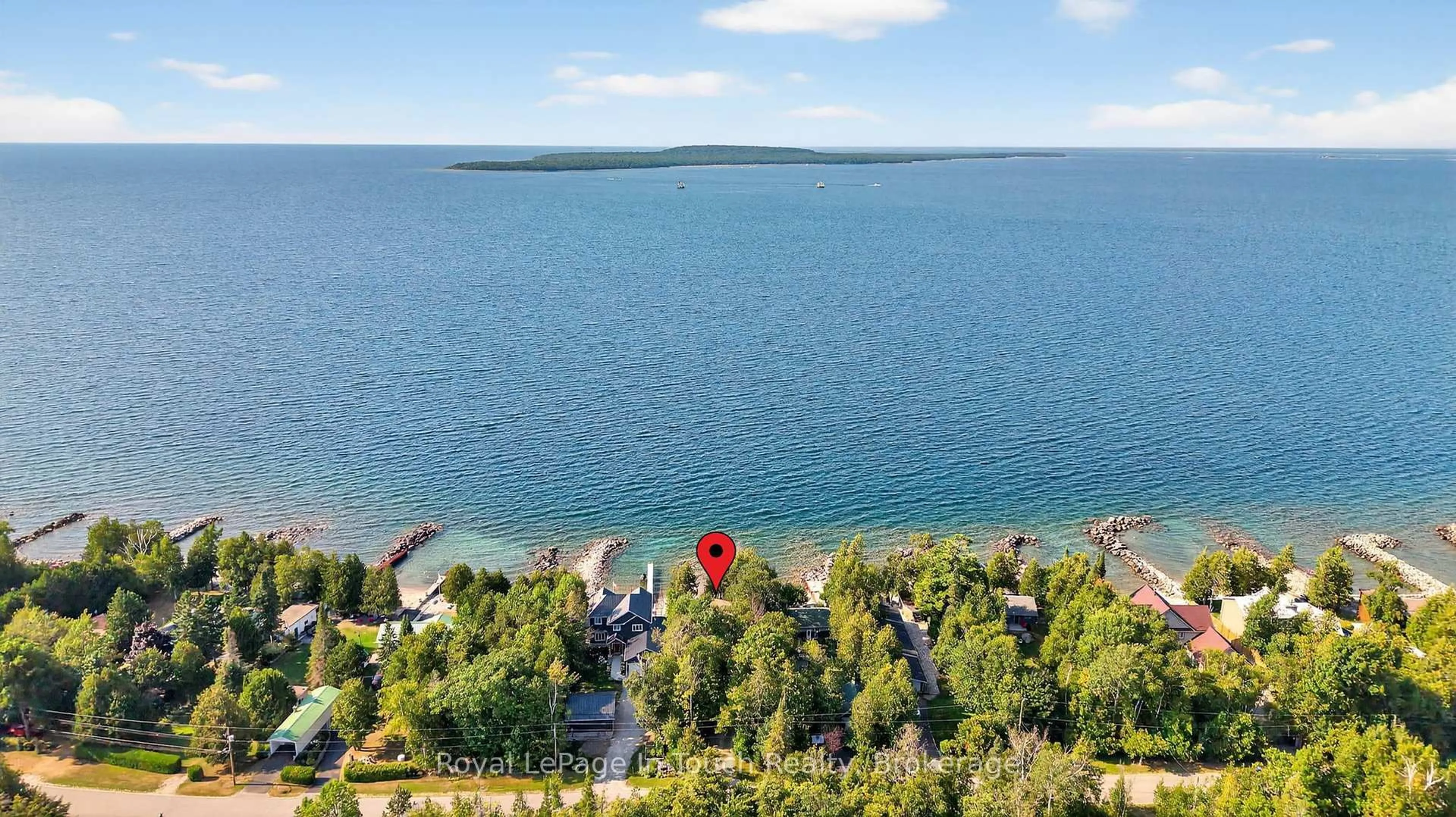A pic from outside/outdoor area/front of a property/back of a property/a pic from drone, water/lake/river/ocean view for 2519 Champlain Rd, Tiny Ontario L9M 0C3