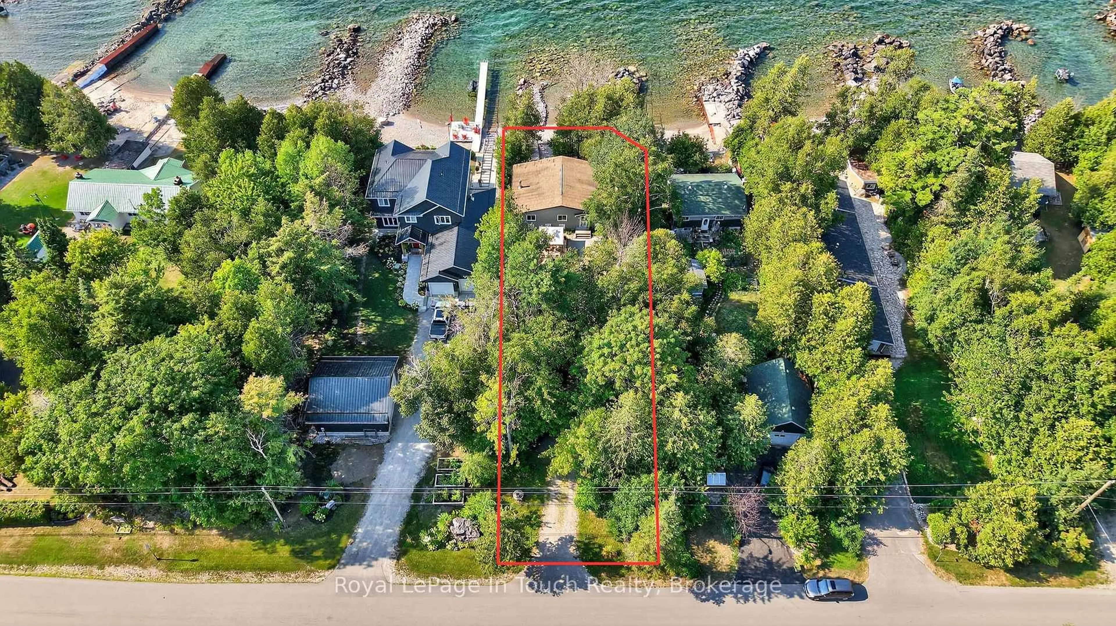 A pic from outside/outdoor area/front of a property/back of a property/a pic from drone, water/lake/river/ocean view for 2519 Champlain Rd, Tiny Ontario L9M 0C3