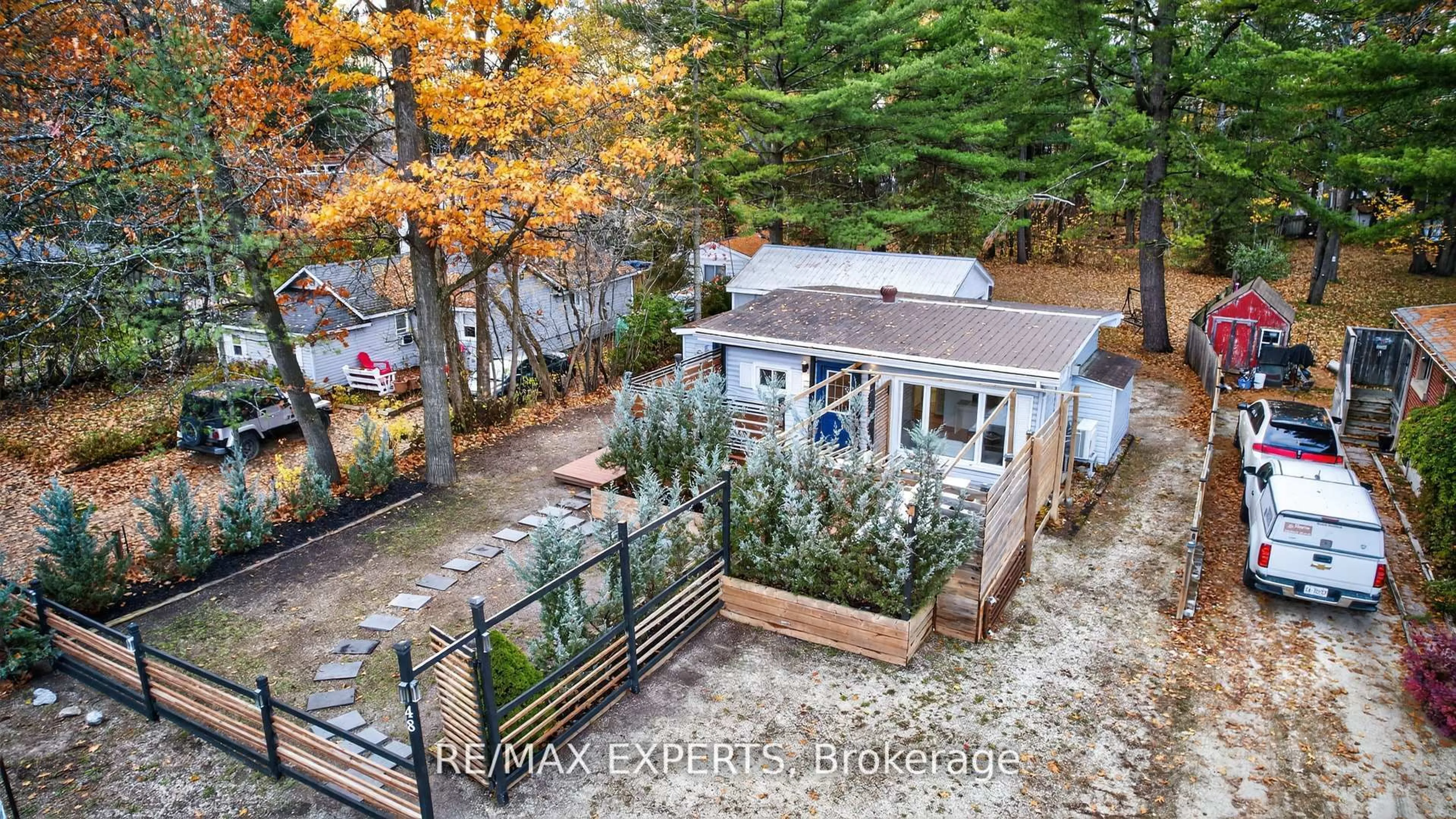 A pic from outside/outdoor area/front of a property/back of a property/a pic from drone, water/lake/river/ocean view for 48 Sunnidale Rd, Wasaga Beach Ontario L9Z 2M5