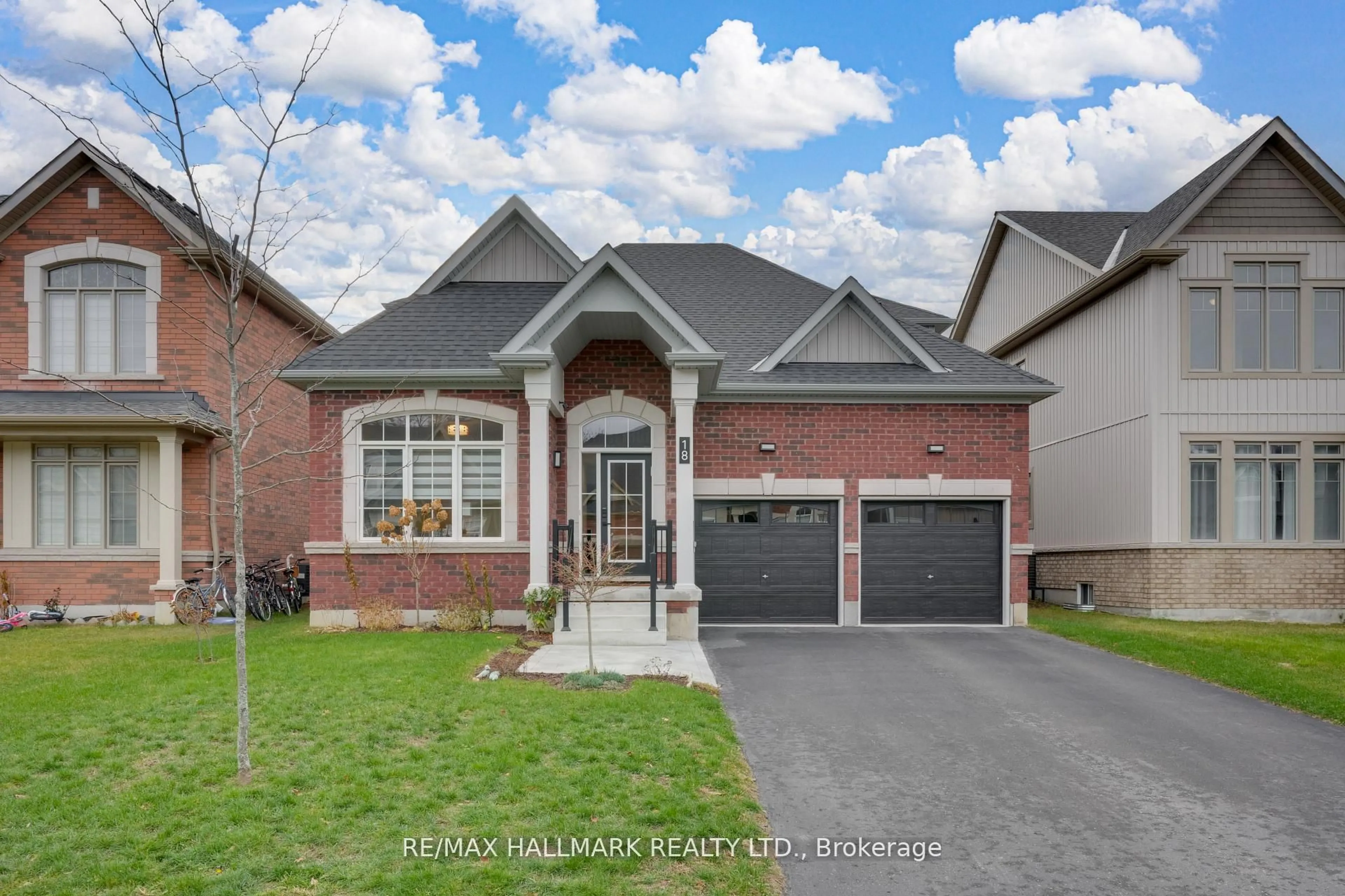 Home with brick exterior material, street for 18 Mclean Ave, Collingwood Ontario L9Y 3V2