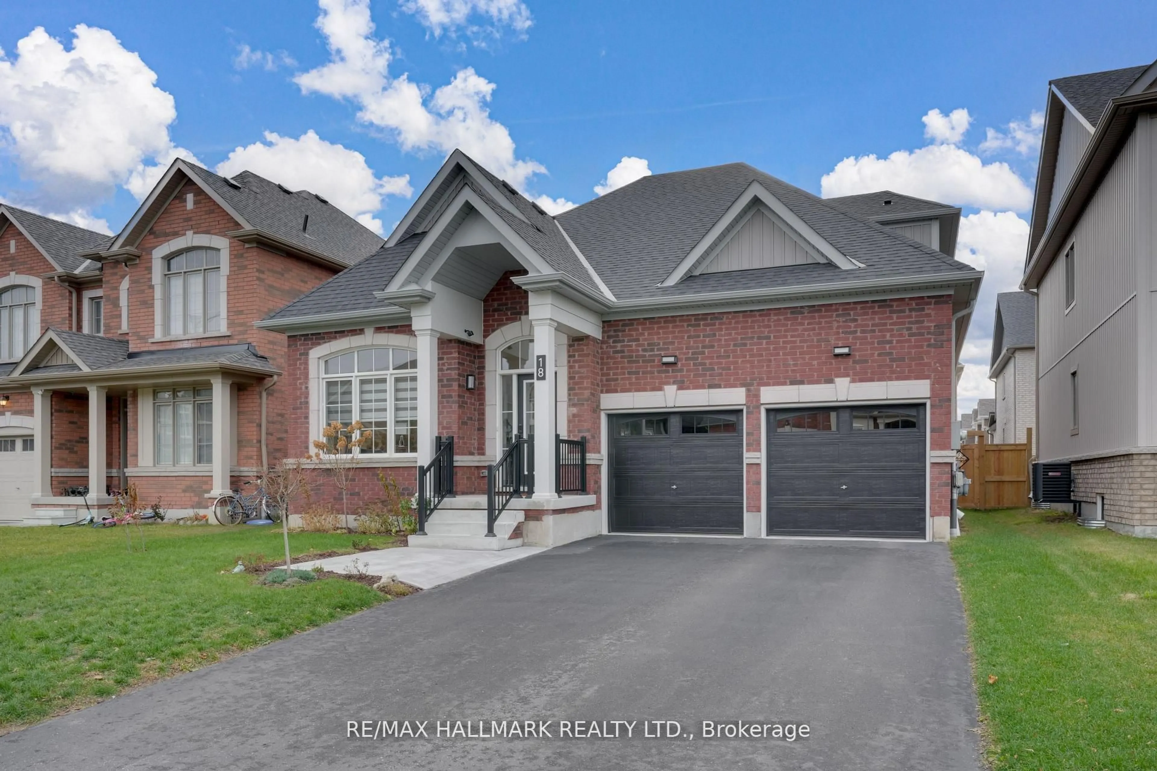 Home with brick exterior material, street for 18 Mclean Ave, Collingwood Ontario L9Y 3V2