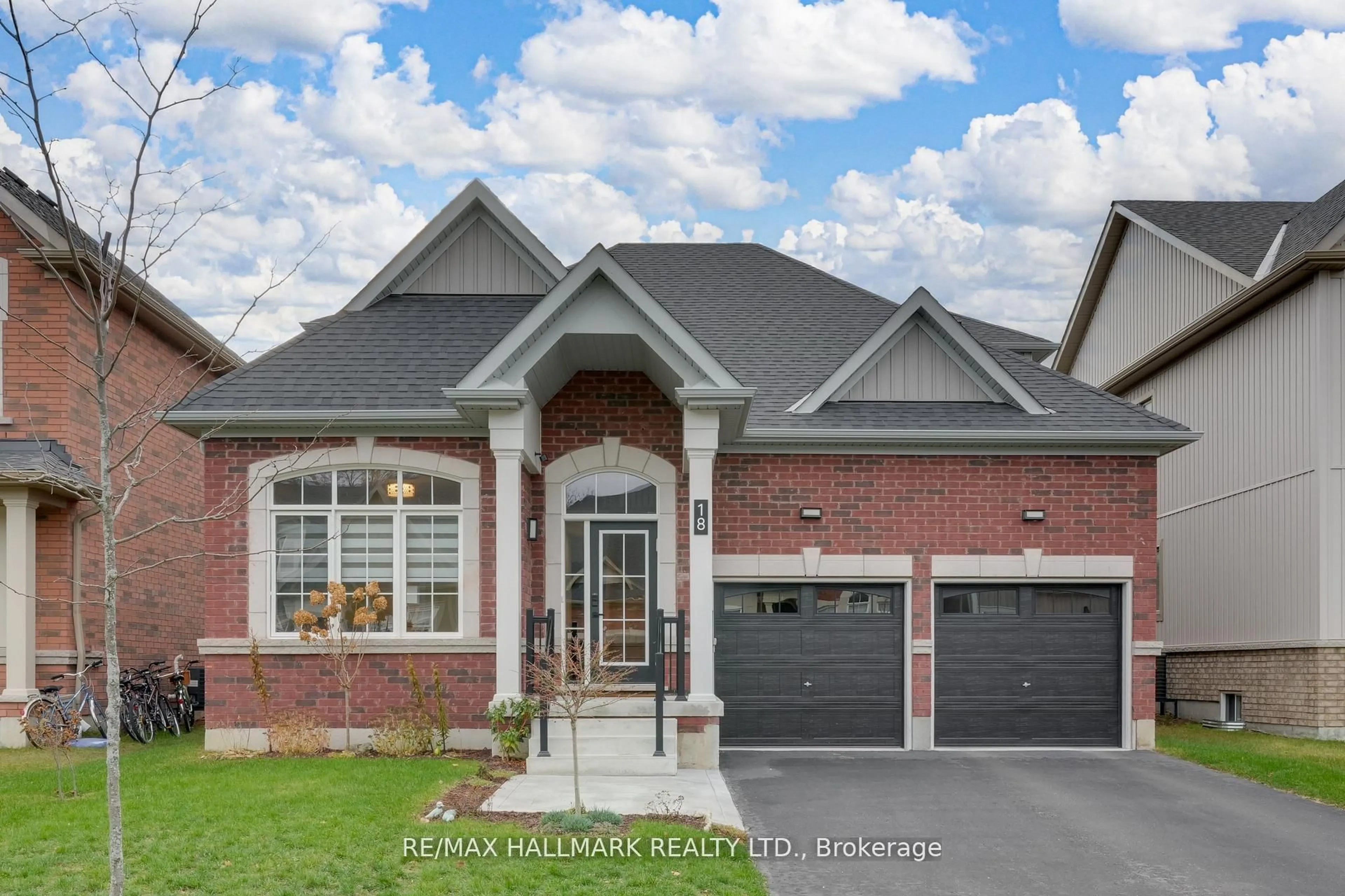 Home with brick exterior material, street for 18 Mclean Ave, Collingwood Ontario L9Y 3V2