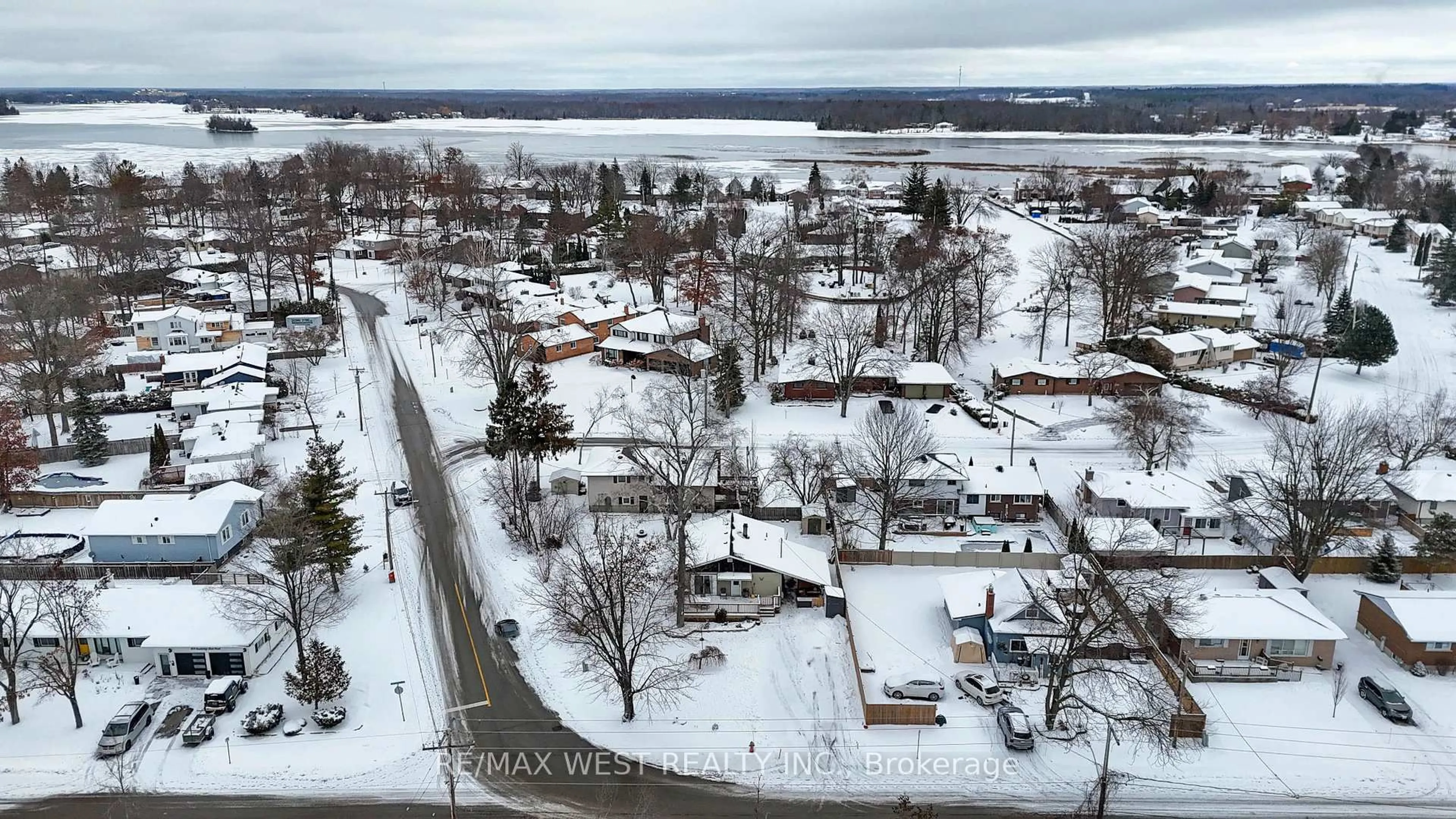 A pic from outside/outdoor area/front of a property/back of a property/a pic from drone, street for 408 Couchiching Point Rd, Orillia Ontario L3V 6P6