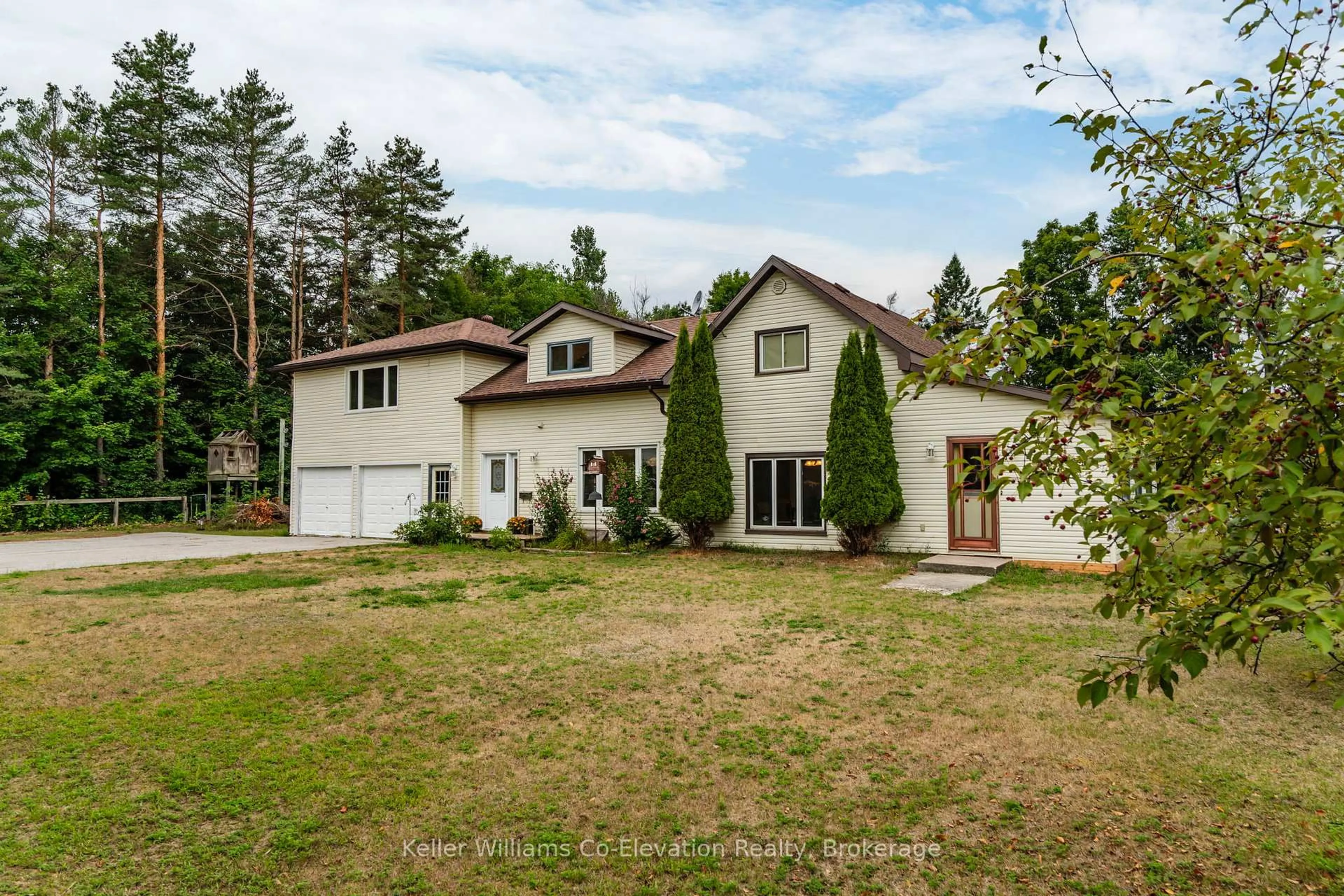 A pic from outside/outdoor area/front of a property/back of a property/a pic from drone, street for 924 6 County Rd, Tiny Ontario L0L 2T0