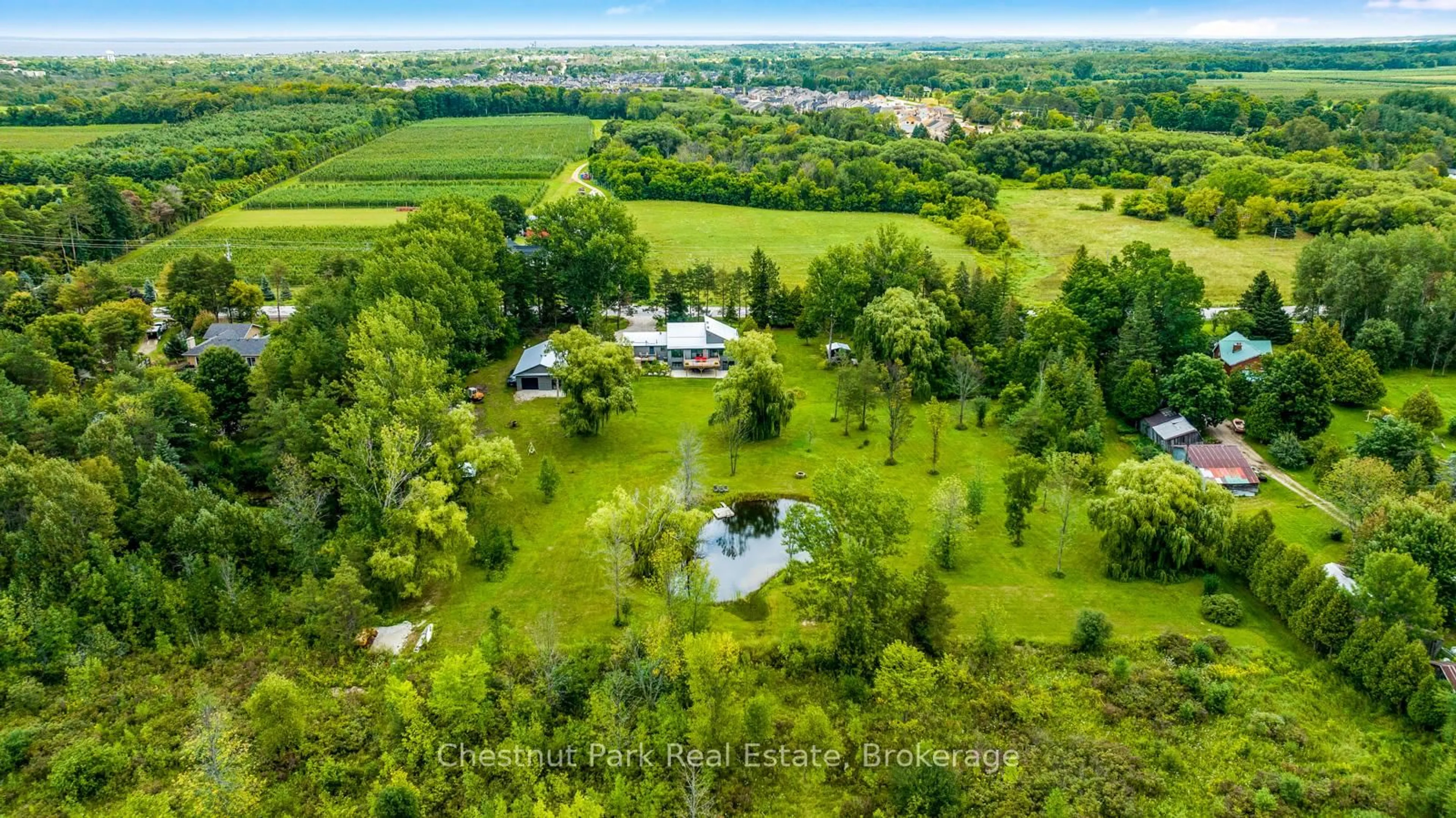 A pic from outside/outdoor area/front of a property/back of a property/a pic from drone, water/lake/river/ocean view for 2890 Nottawasaga Conc 10, Clearview Ontario L9Y 3Y9