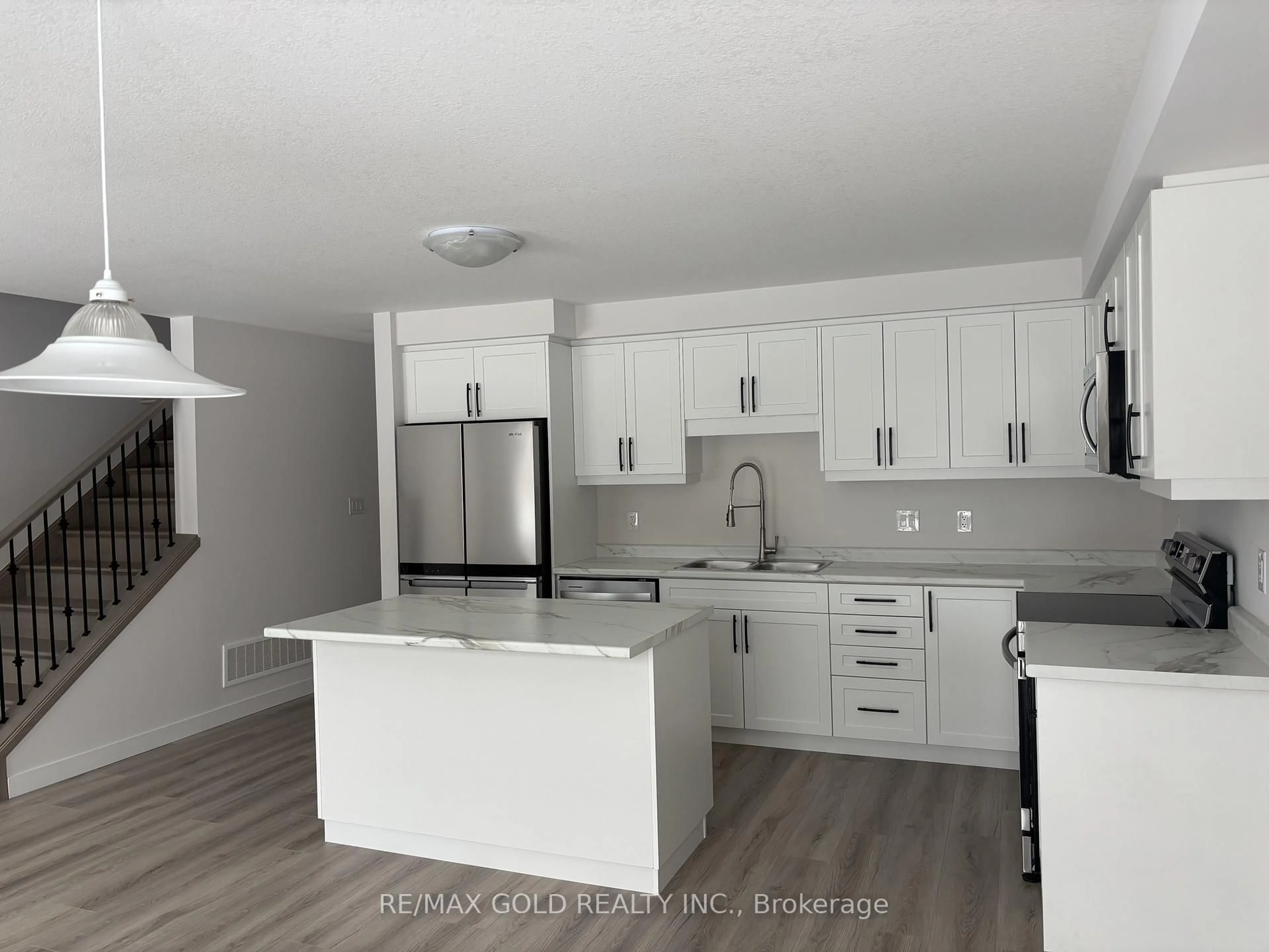 Open concept kitchen, unknown for 169 Queen St #LOT 10, Springwater Ontario L0L 1P0
