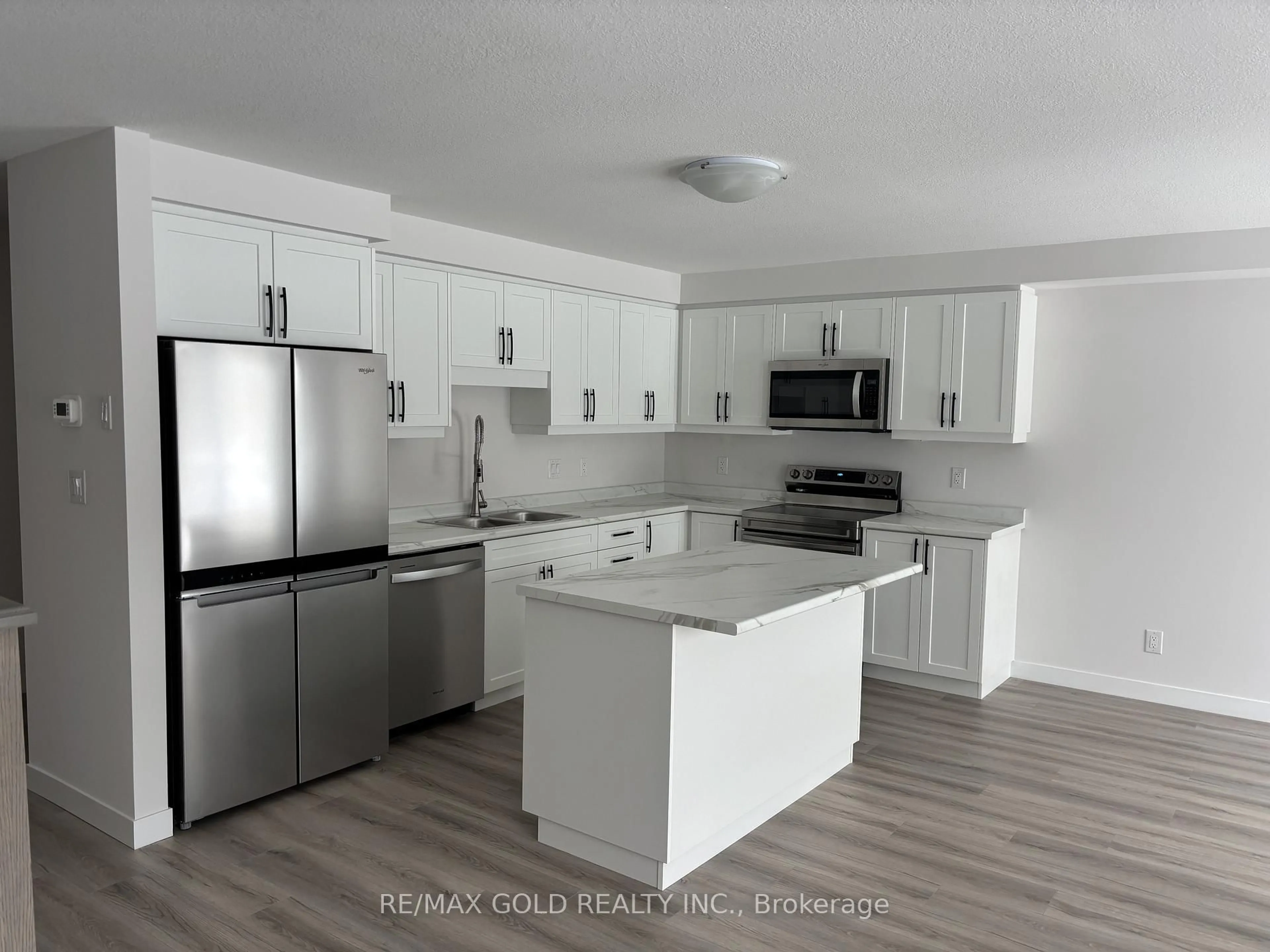 Open concept kitchen, unknown for 169 Queen St #LOT 10, Springwater Ontario L0L 1P0