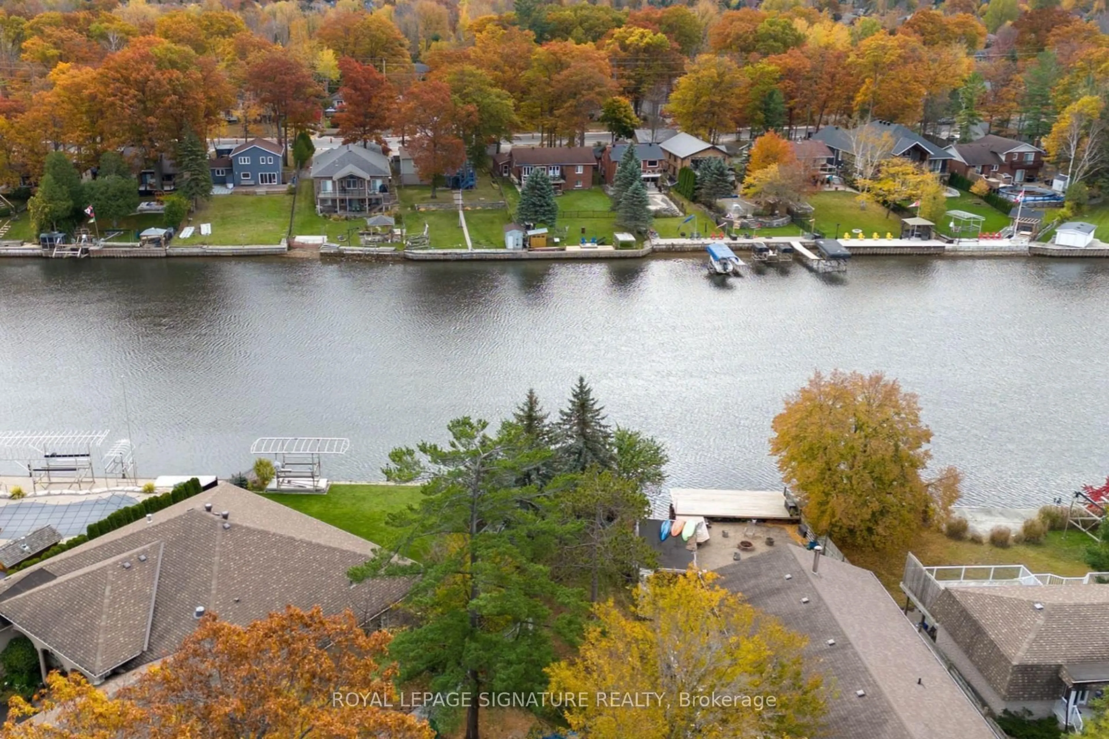 A pic from outside/outdoor area/front of a property/back of a property/a pic from drone, water/lake/river/ocean view for 75 Old Mosley St, Wasaga Beach Ontario L9Z 2J5