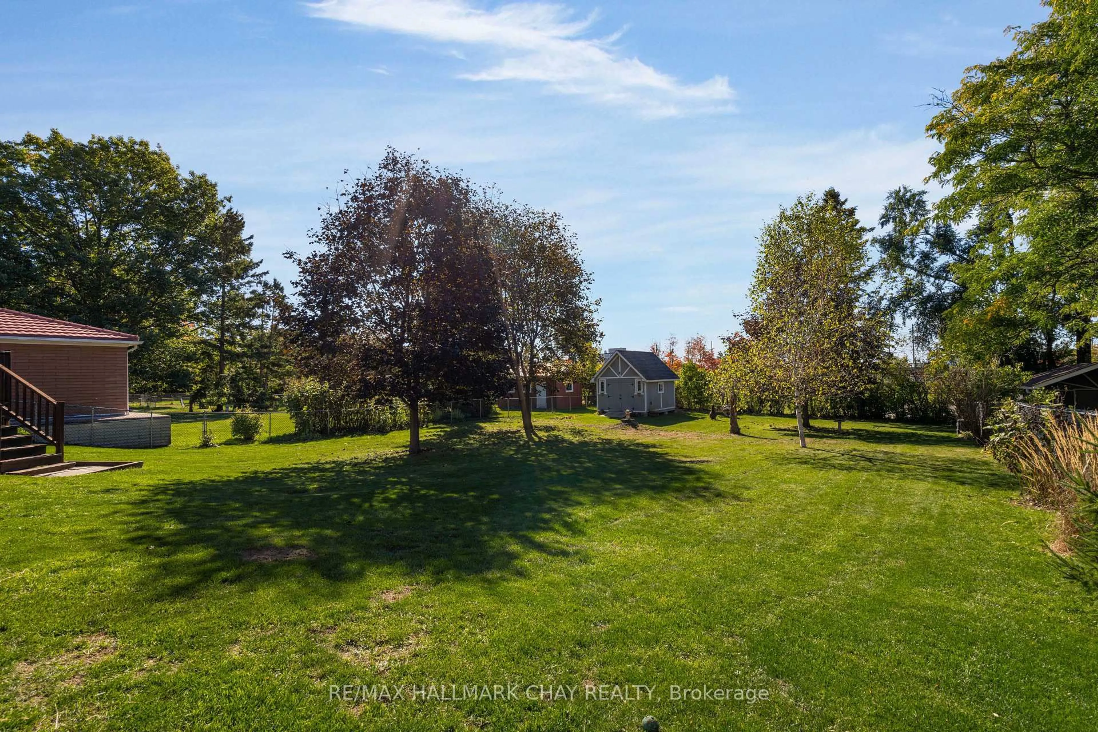 A pic from outside/outdoor area/front of a property/back of a property/a pic from drone, forest/trees view for 221 Warnica Rd, Barrie Ontario L4N 3Z2